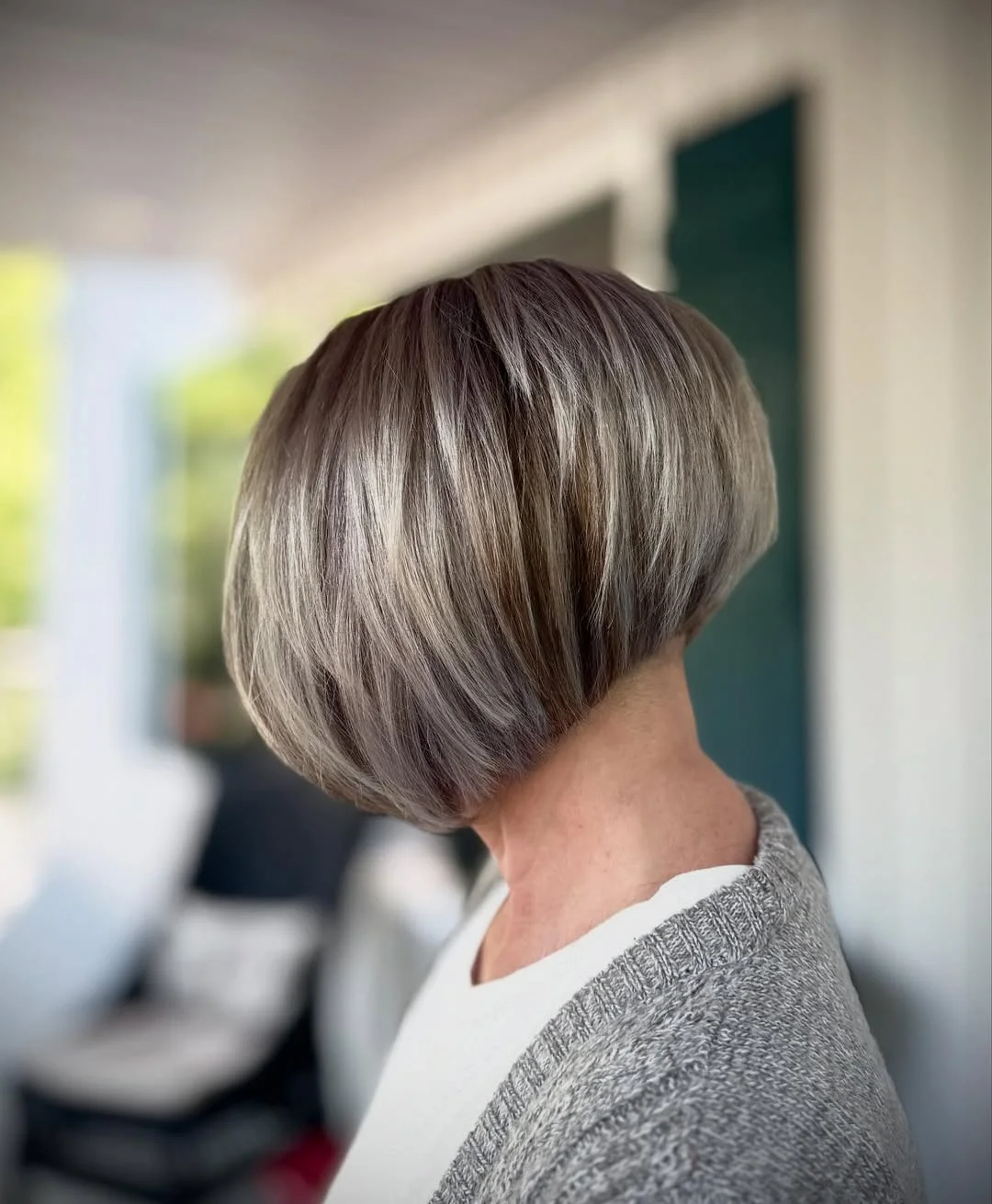 stylish summer haircuts for plus size women 2026 Rounded volumized bob with sculpted shape