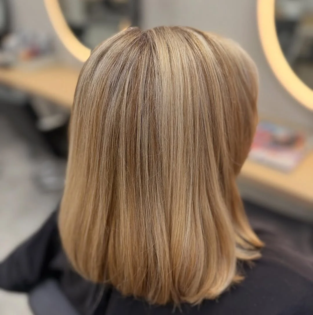 stylish summer haircuts for plus size women 2026 Soft blunt shoulder-length cut with natural polish