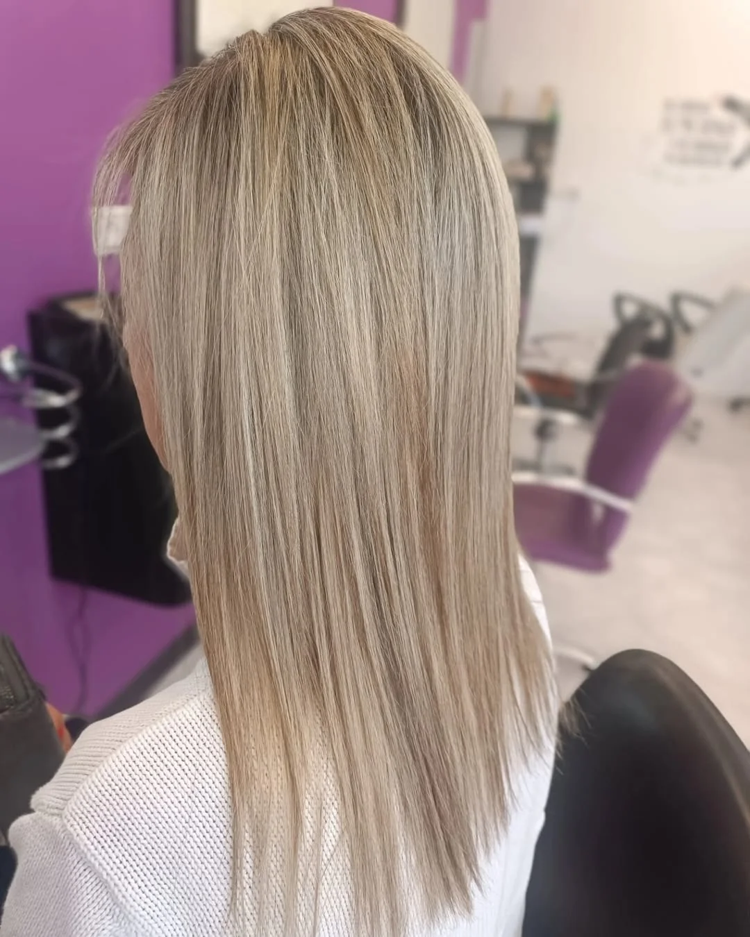 stylish summer haircuts for plus size women 2026 Feathered platinum layers with soft taper