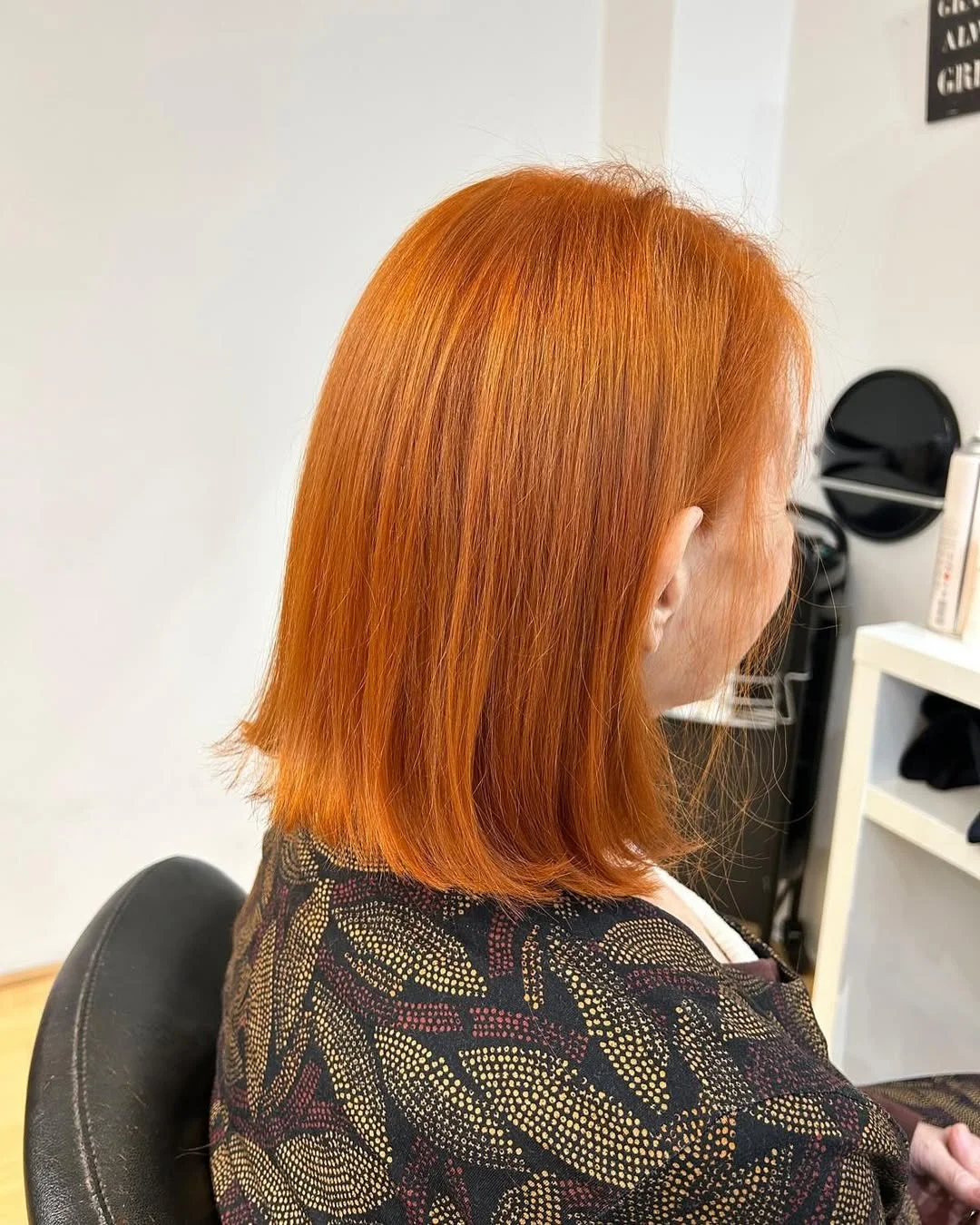 stylish summer haircuts for plus size women 2026 Vibrant copper blunt cut with soft texture