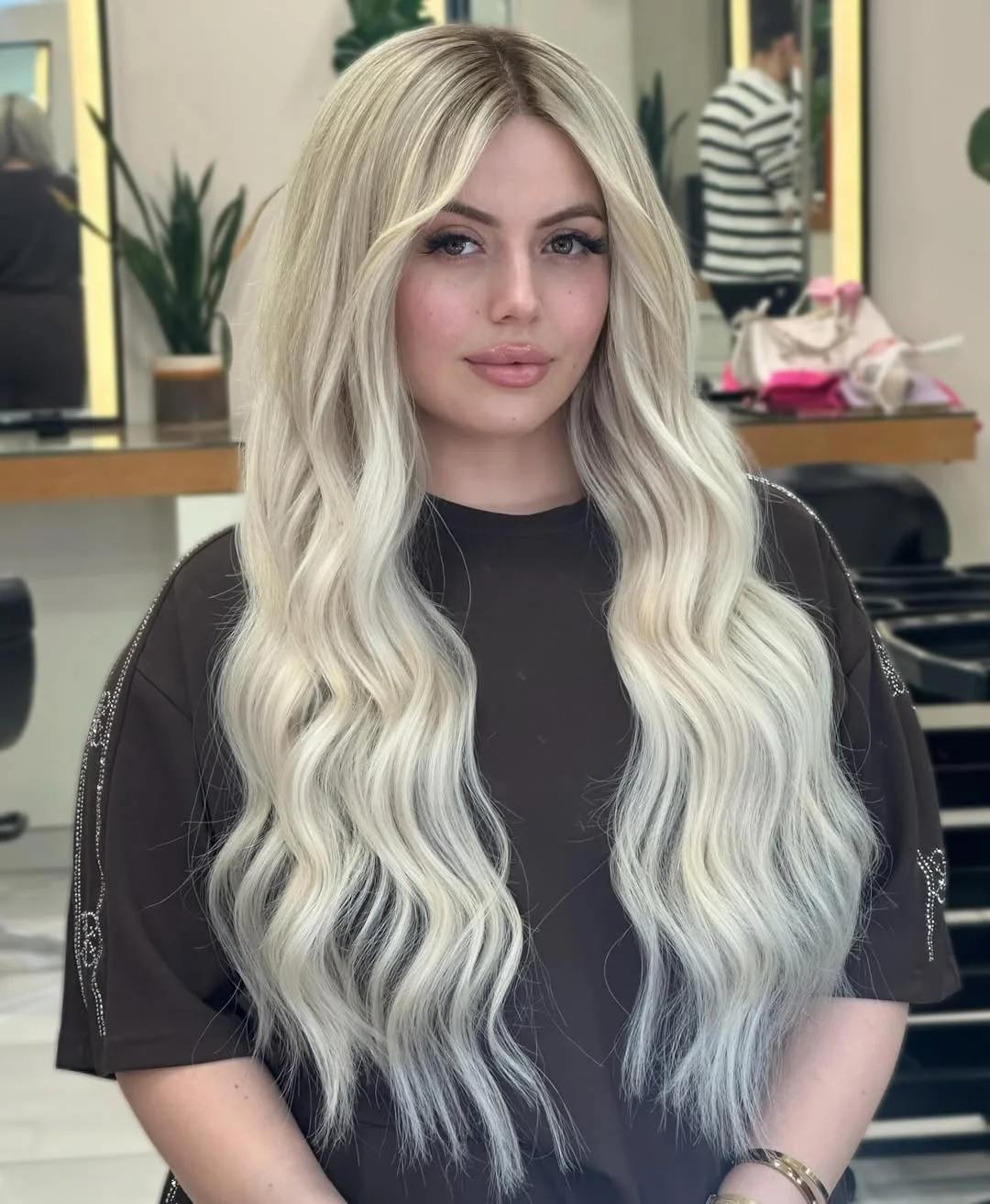 stylish summer haircuts for plus size women 2026 Icy long waves with a bold center part