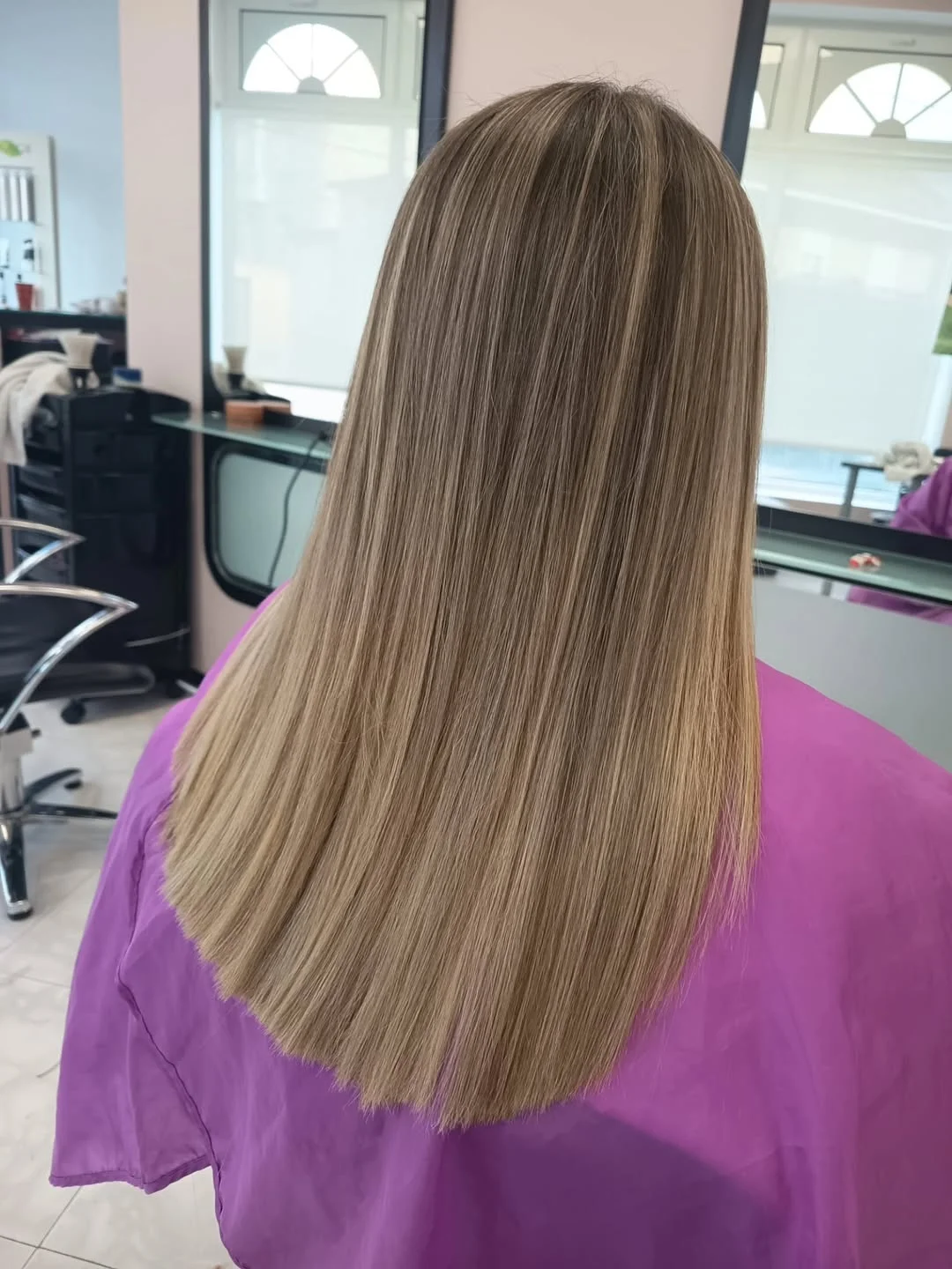 stylish summer haircuts for plus size women 2026 Smooth layered blonde length with subtle shaping