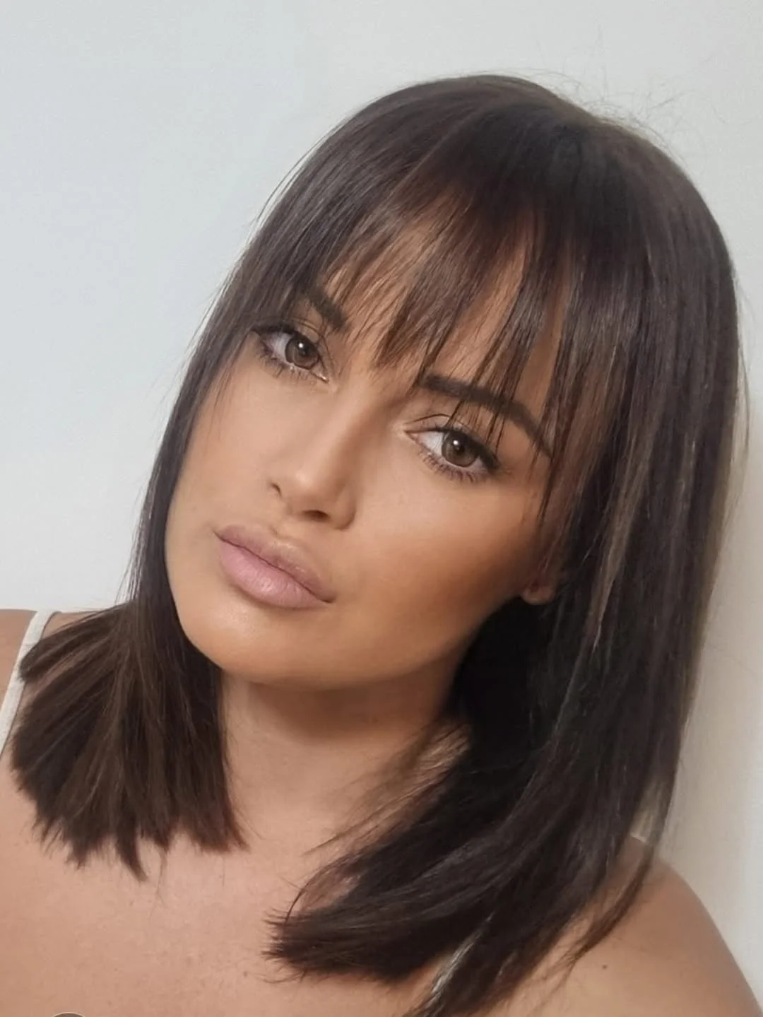 stylish summer haircuts for plus size women 2026 Shoulder-length blunt cut with soft fringe