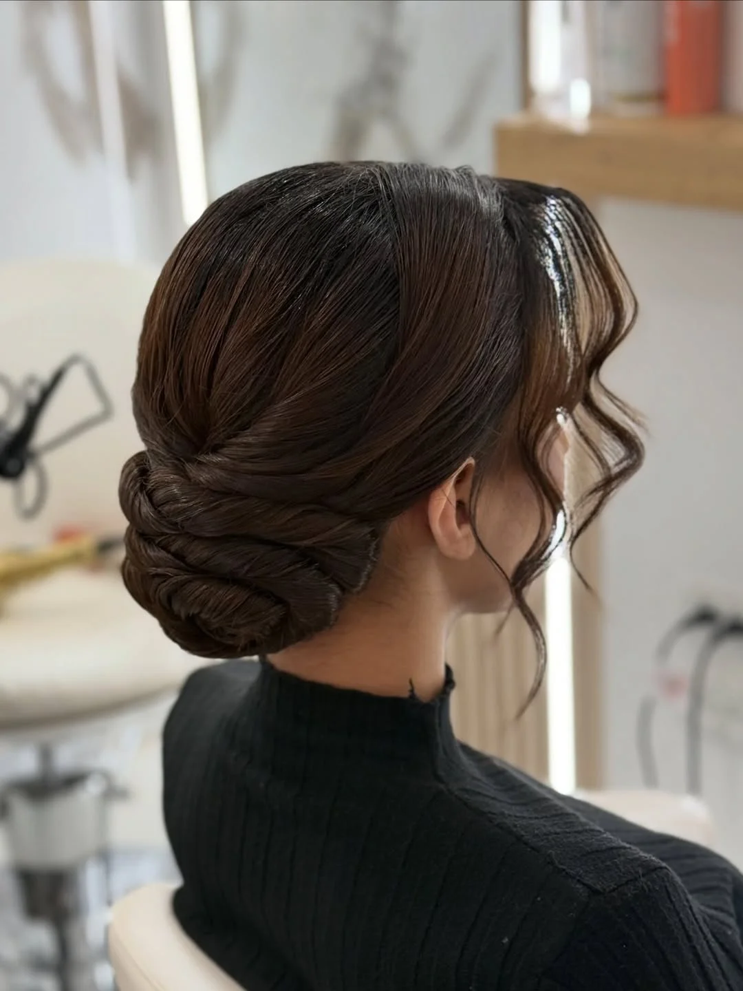 stylish summer updo hairstyles 2026 Elegant Twisted Low Roll With Soft Face-Framing Curls