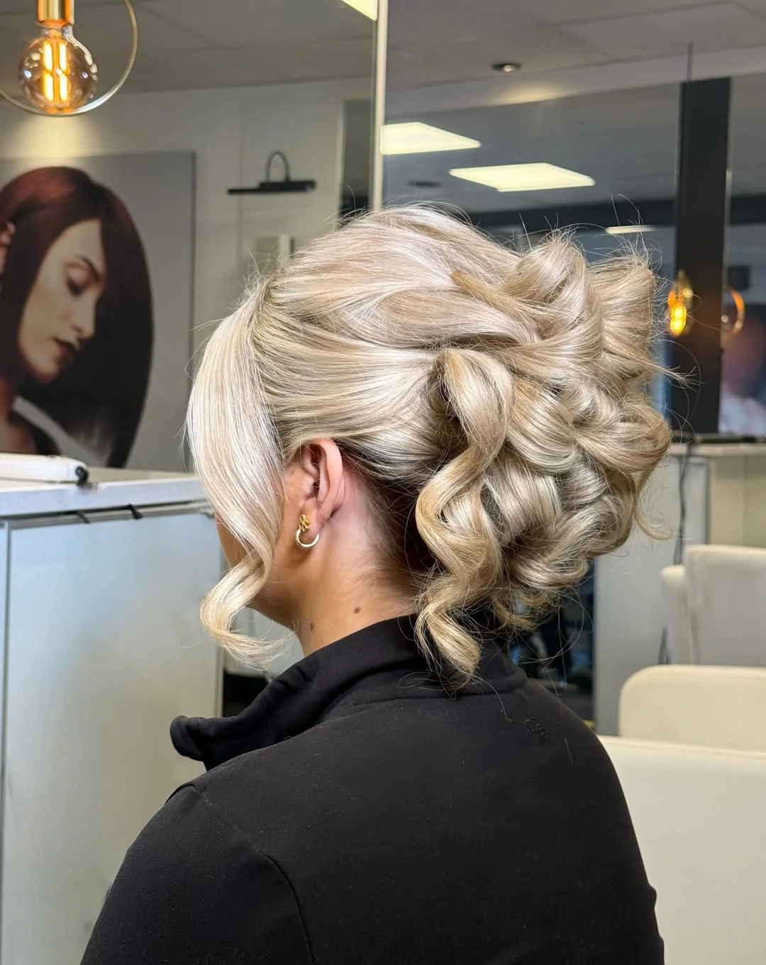 stylish summer updo hairstyles 2026 Voluminous Platinum Curly Updo With Glamorous Texture