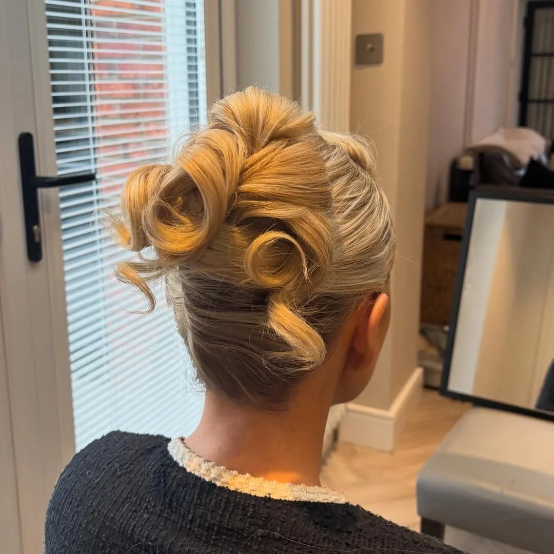 stylish summer updo hairstyles 2026 Vintage-Inspired Blonde Updo With Sculpted Curl Details