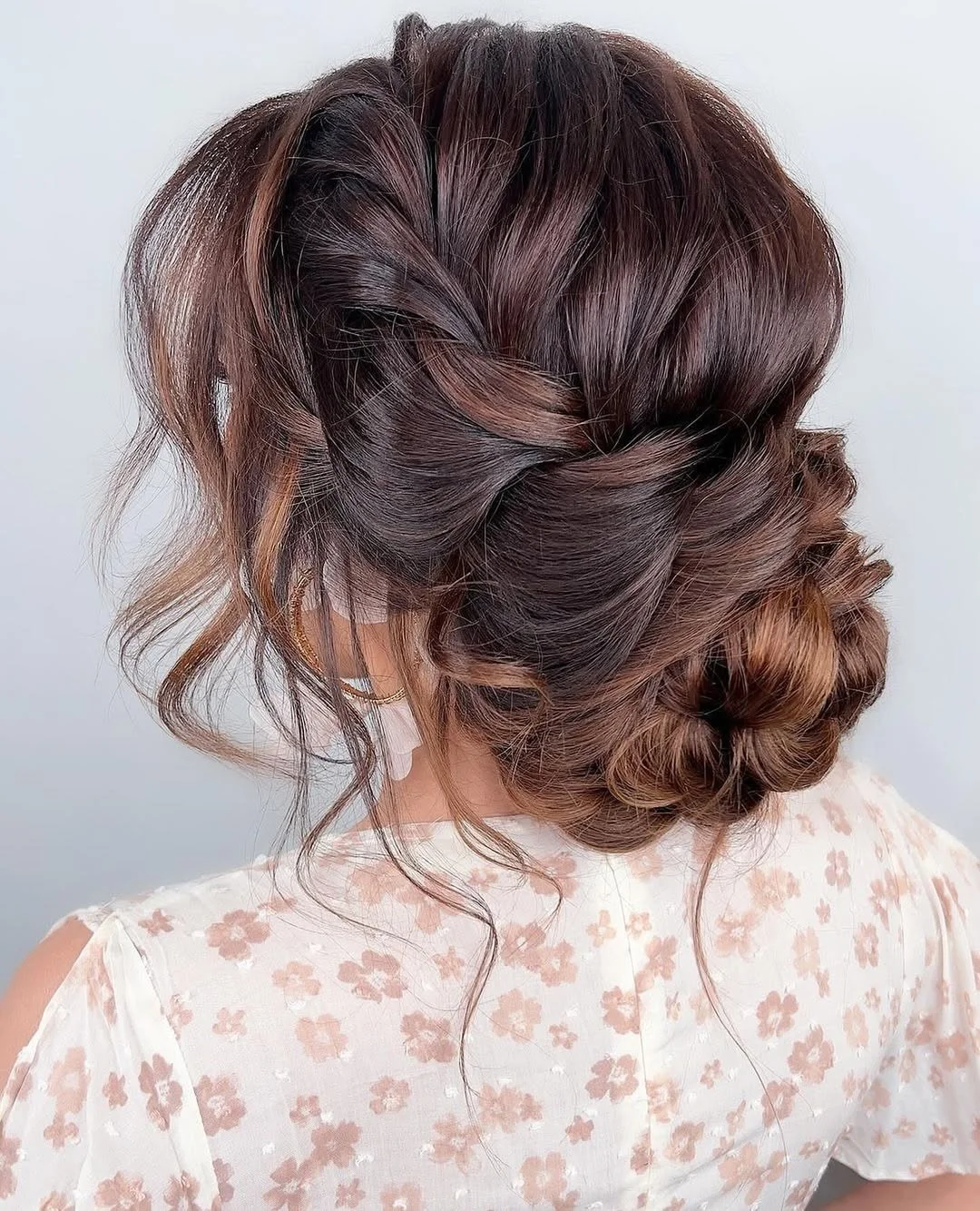 stylish summer updo hairstyles 2026 Romantic Braided Low Bun With Soft Summer Texture