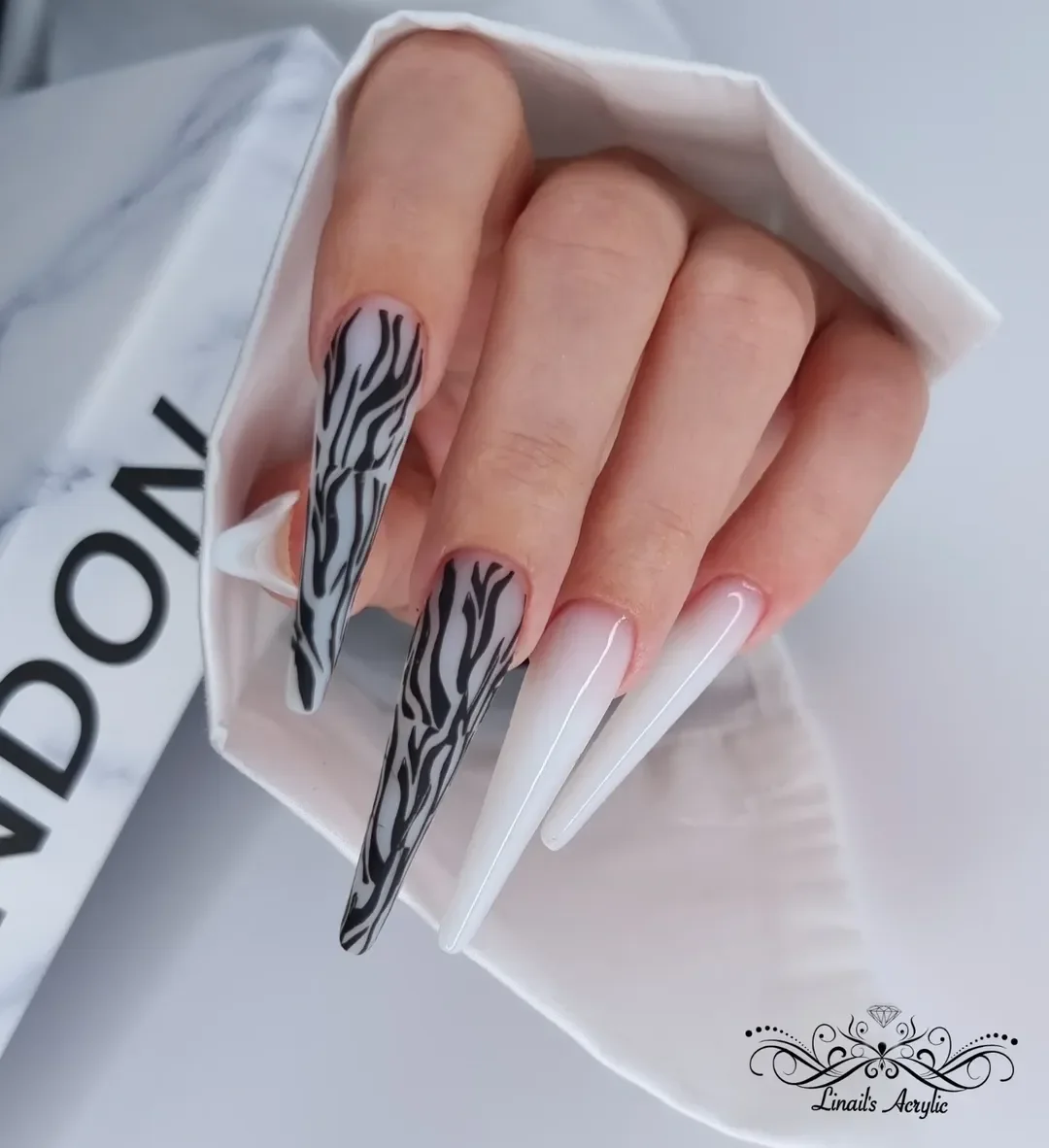 summer acrylic nails 2026 Black And White Zebra Stiletto Nails