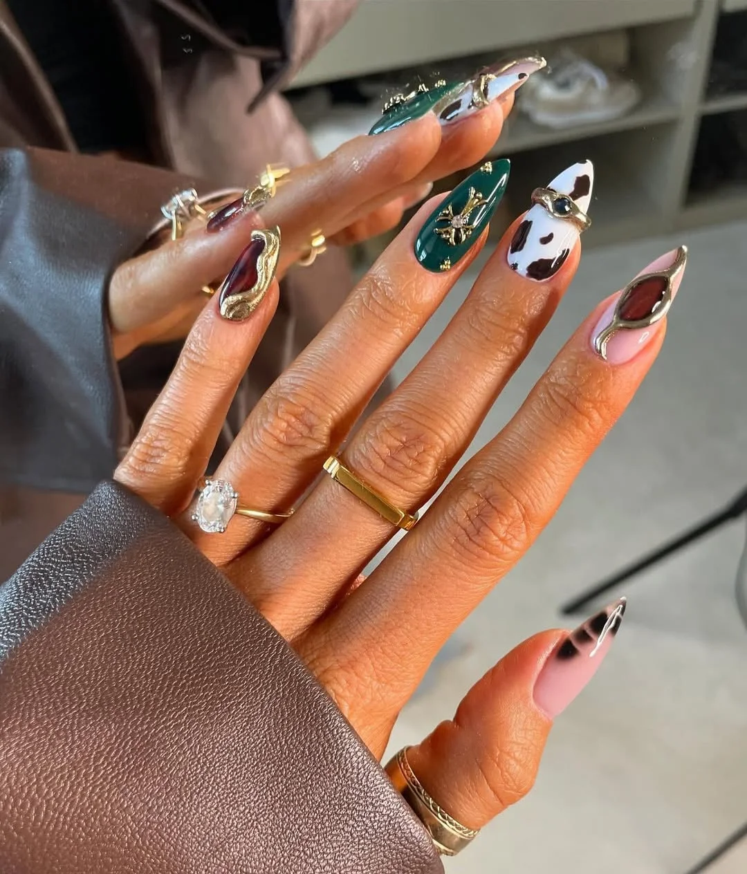summer acrylic nails 2026 Emerald Cow Print Almond Nails
