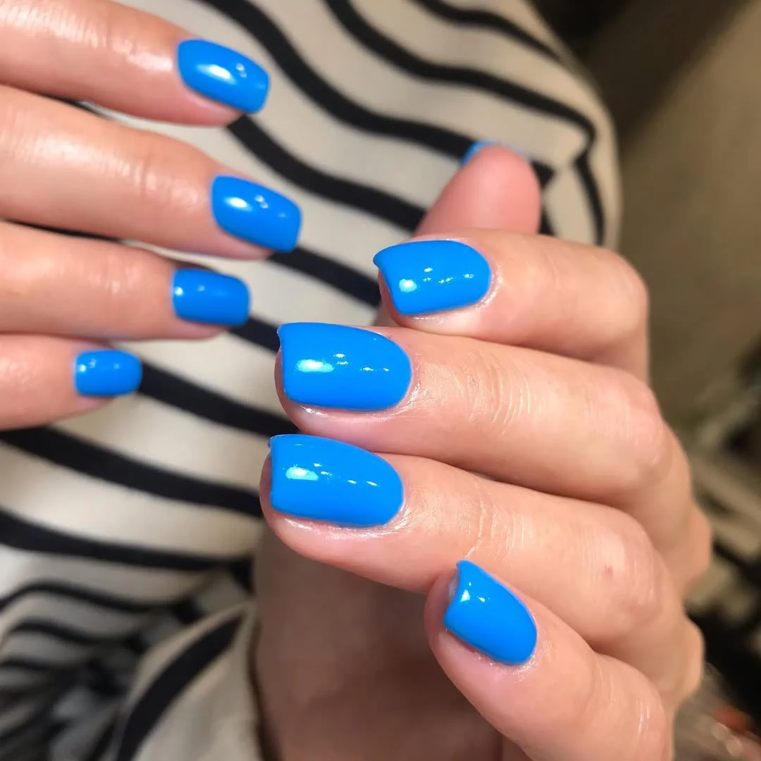 Summer beach nail ideas 2026 Electric Ocean Blue for Poolside Days