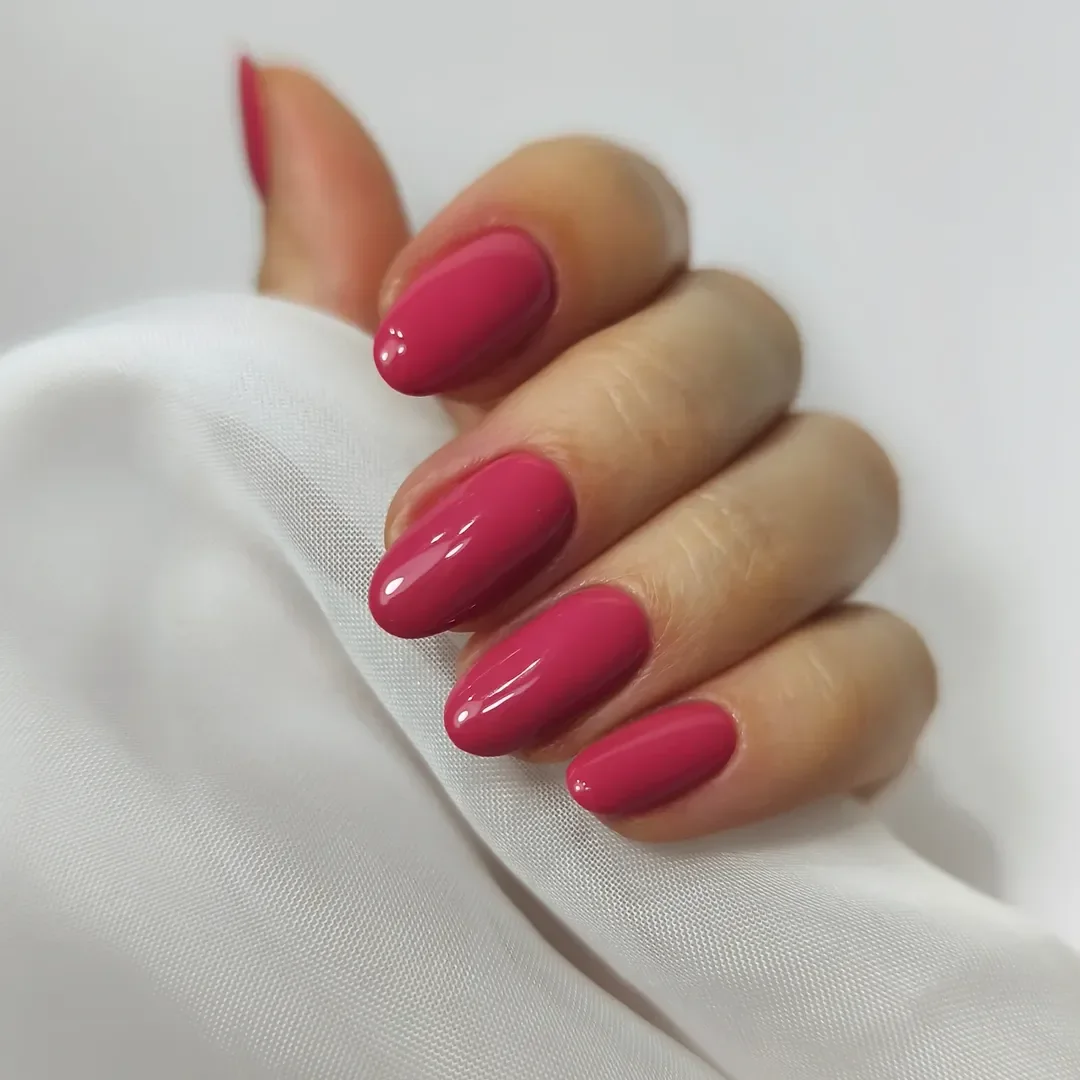 Summer beach nail ideas 2026 Glossy Berry Pink for Tropical Getaways