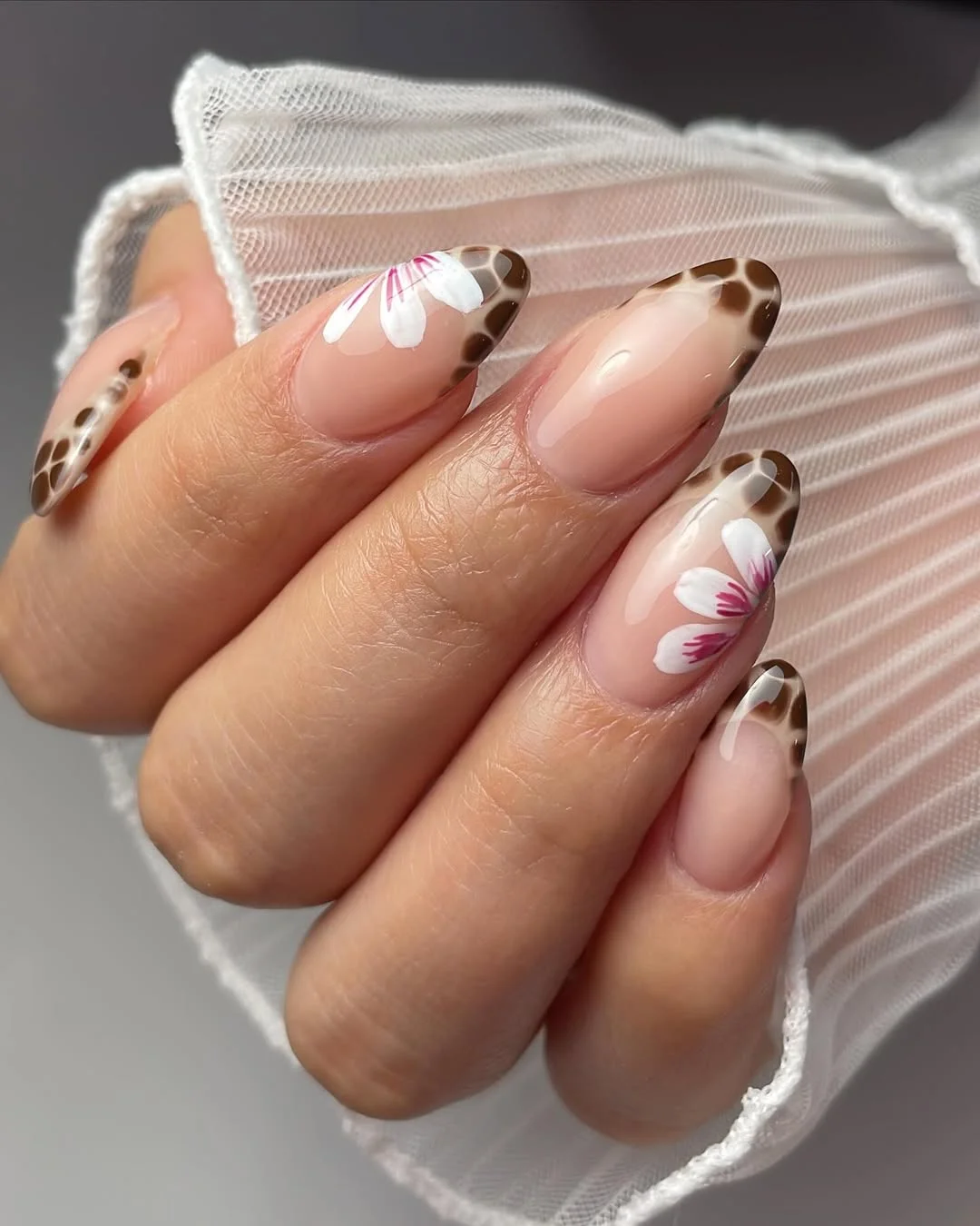 summer dip nails 2026 Soft Floral French Tips With a Wild Twist