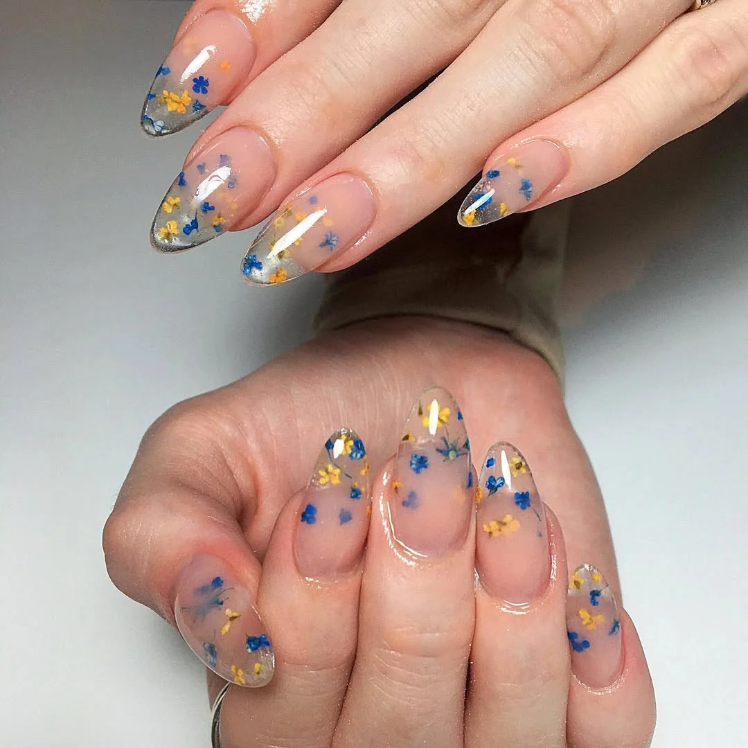 summer flower nails 2026 Transparent Wildflower Nails With Blue And Yellow Petals