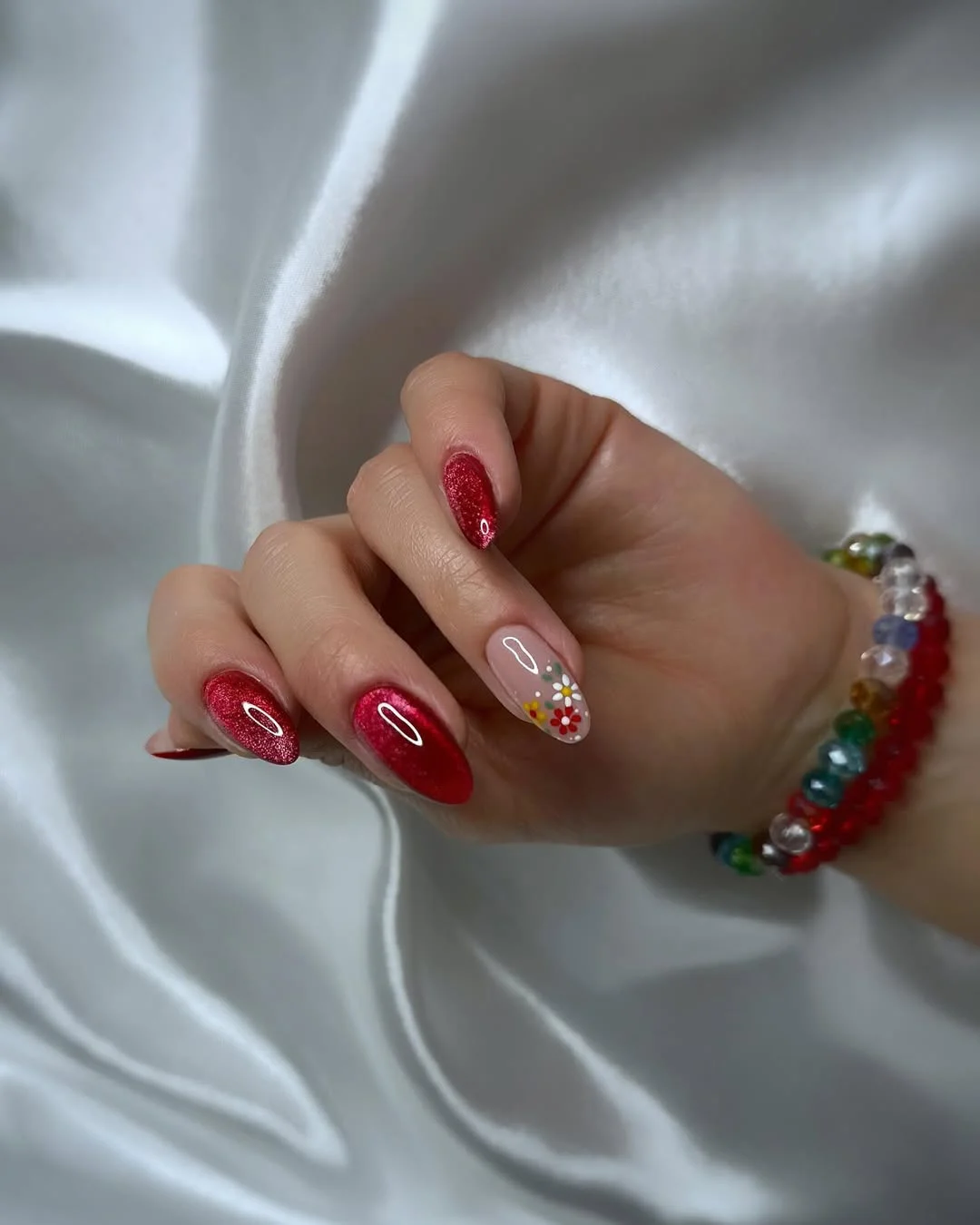 summer flower nails 2026 Cherry Red Floral Nails With Glossy Sparkle Finish