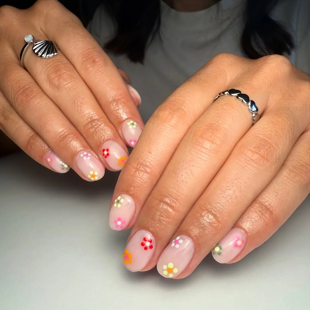summer flower nails 2026 Mini Rainbow Daisy Nails With Milky Pink Base