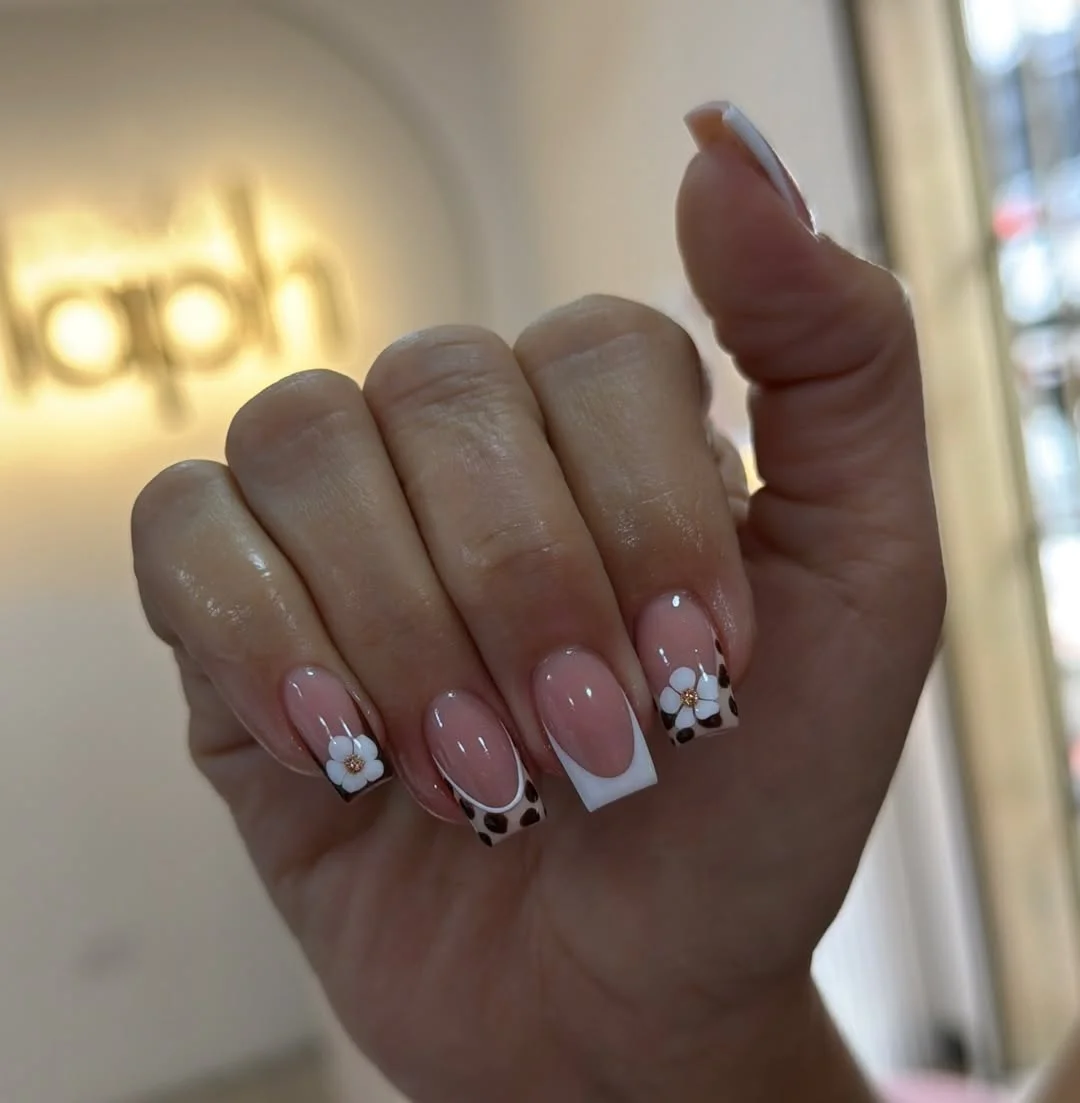 summer gel nails 2026 Minimal Floral French Tips With A Soft Square Shape
