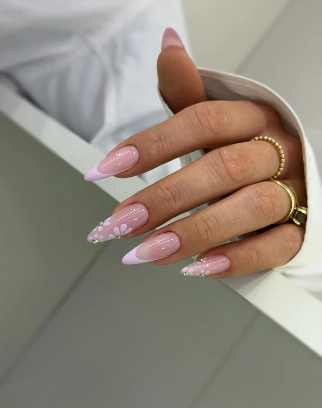 summer gel nails 2026 Soft Pink French Tips With Tiny Floral Details