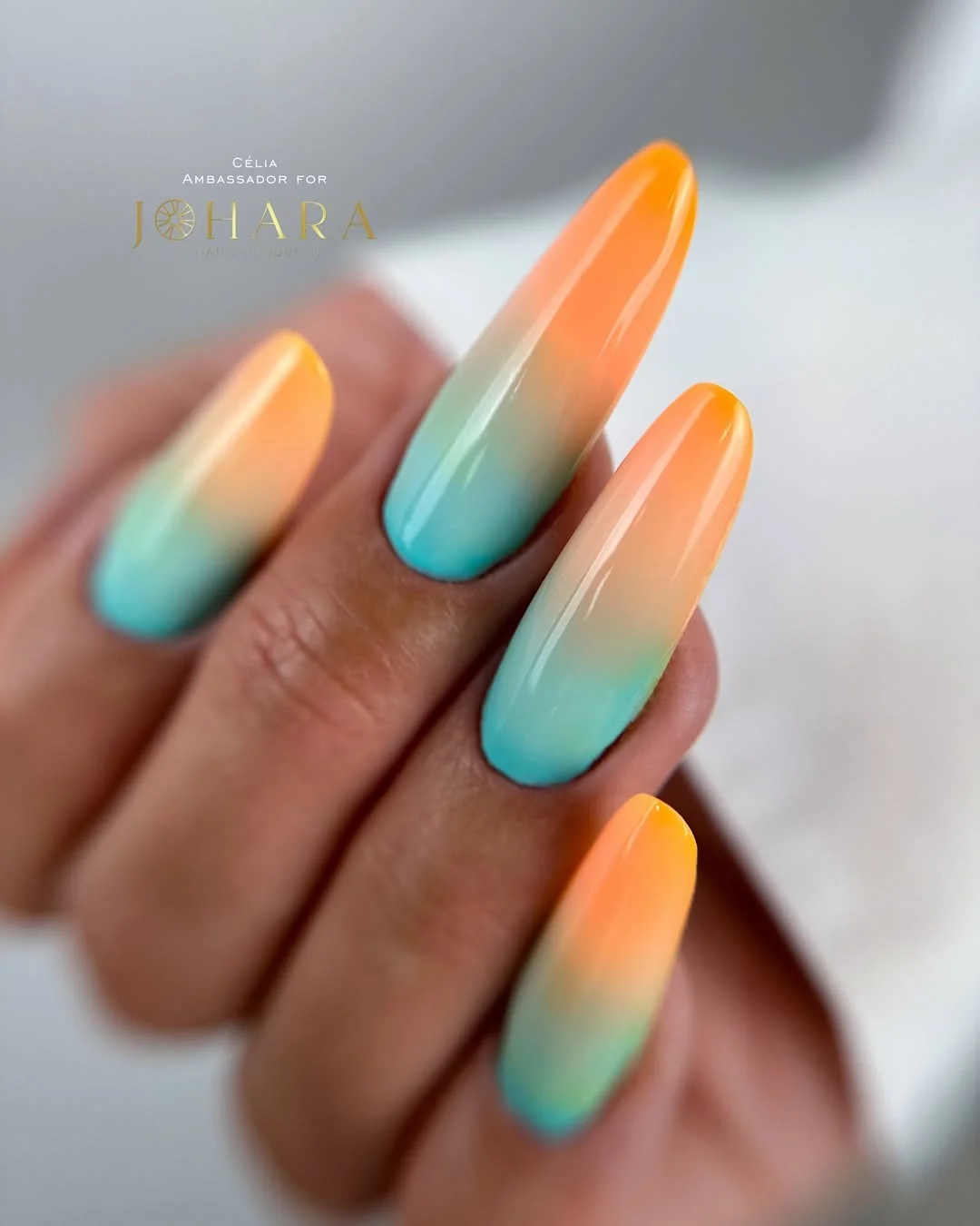 summer gel nails 2026 Sunset Ombre Nails With Tropical Blue And Orange Blending