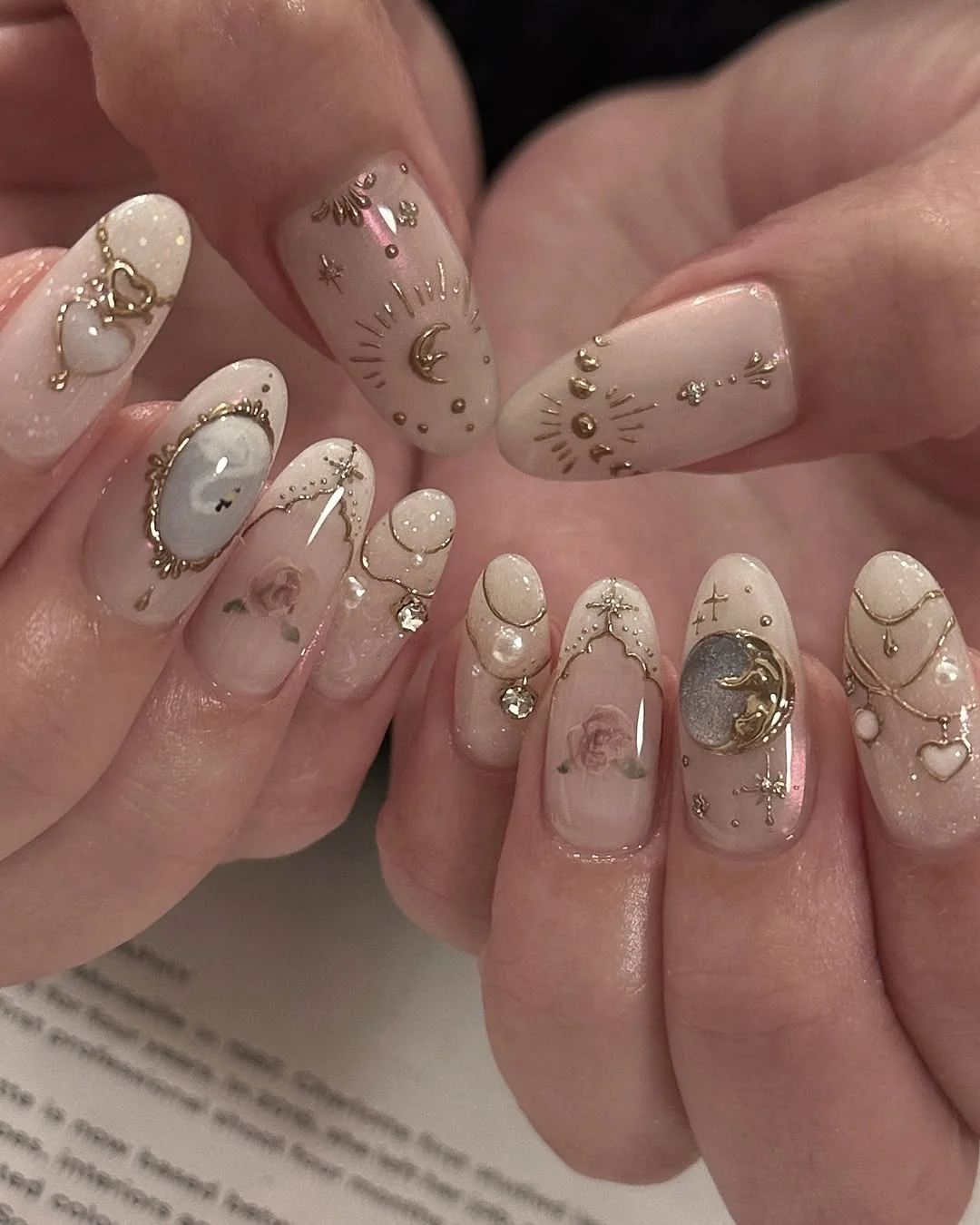 summer gel nails 2026 Celestial Pearl Nails With Vintage Gold Details