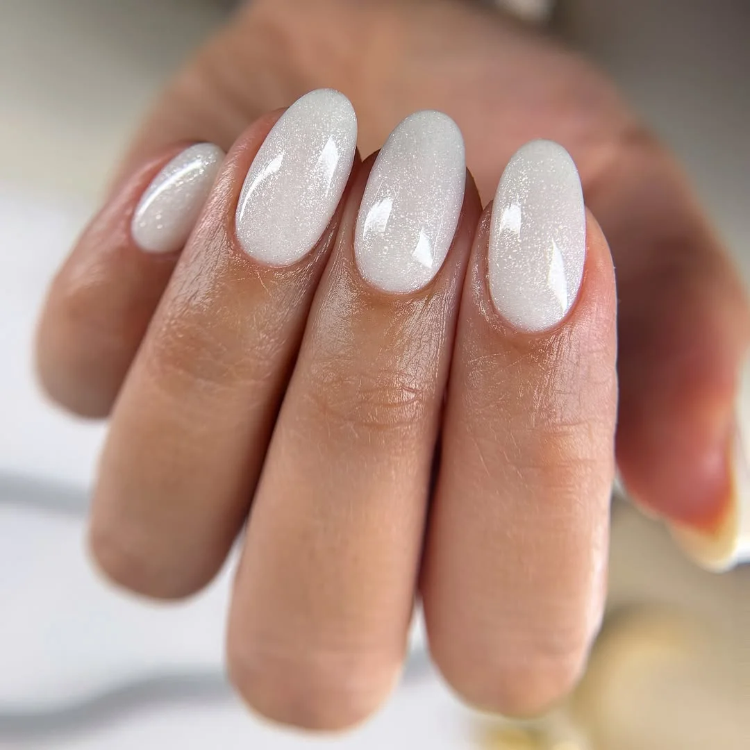summer glitter nails 2026 Snowy White Shimmer That Glows in Summer Sunlight