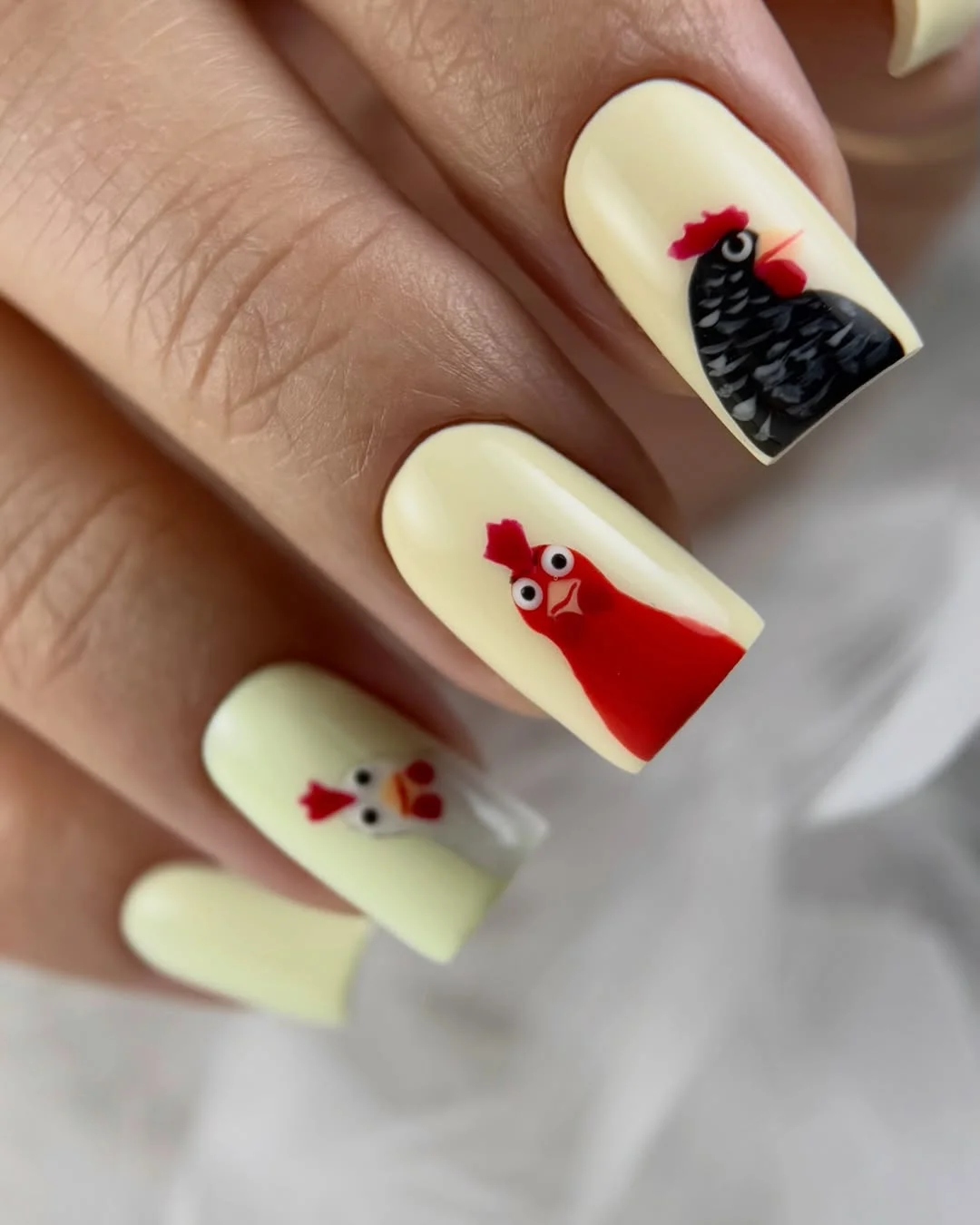 summer manicure color ideas 2026 Playful Chicken Nail Art With Creamy Butter Yellow Polish