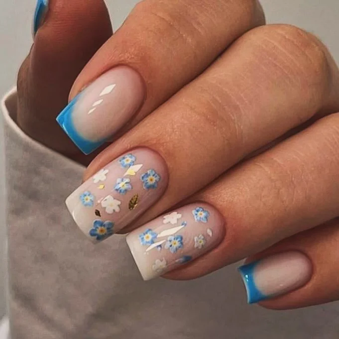 summer manicure color ideas 2026 Blue Floral French Tips That Feel Like a European Summer