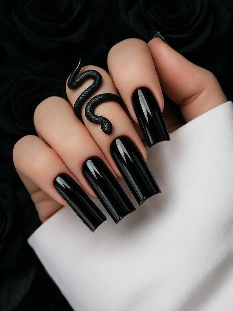 summer nail art 2026 Glossy Black Coffin Nails With a Dark Serpent Twist