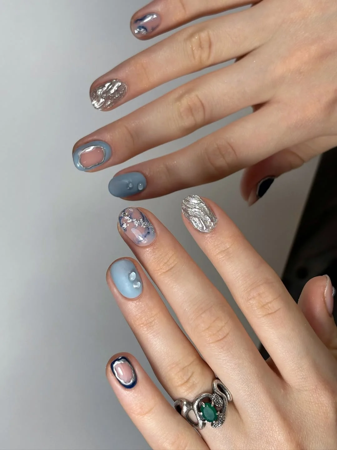 summer nail art 2026 Dusty Blue Metallic Nails With Modern Abstract Details