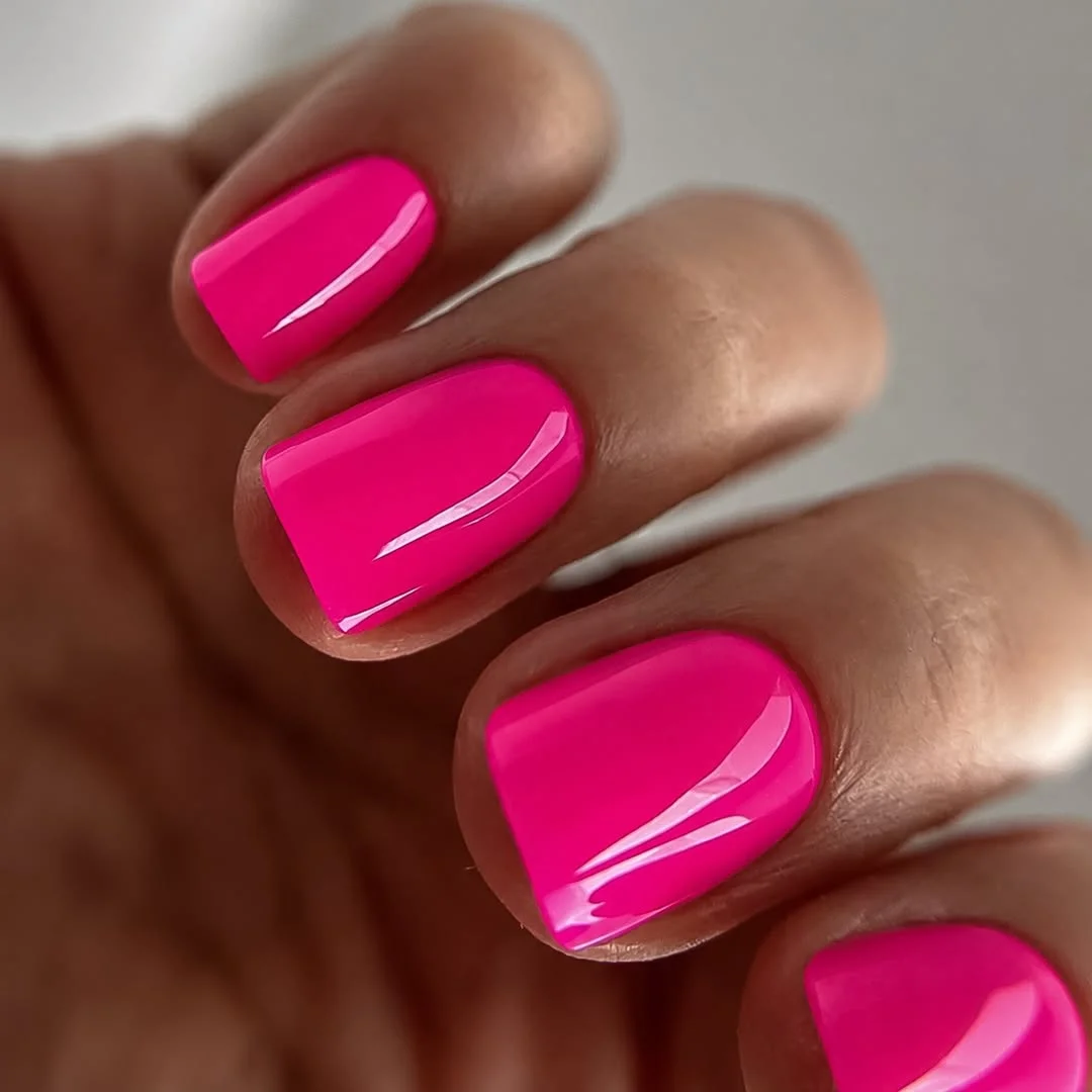 summer nail colors 2026 Electric Pink Nails That Practically Glow In Sunlight
