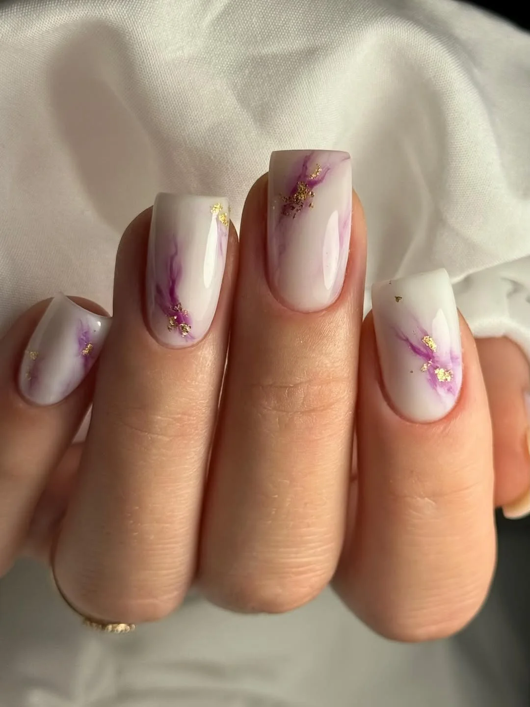 summer nail colors 2026 Lavender Marble Nails With Soft Gold Accents