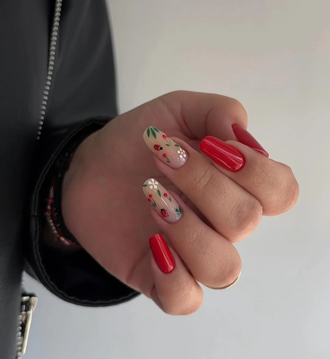 summer nail inspo 2026 Cherry Red Floral Nails With a Soft Vintage Feel