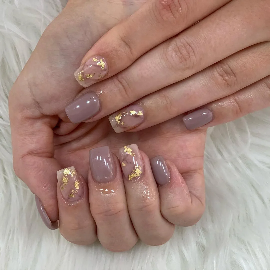 summer nails square 2026 Glossy Taupe Marble Nails With Gold Foil Accents