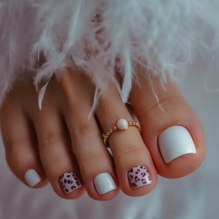 summer pedicure colors 2026 White and Leopard Accent Pedicure for the Cool Girl Trend Lover