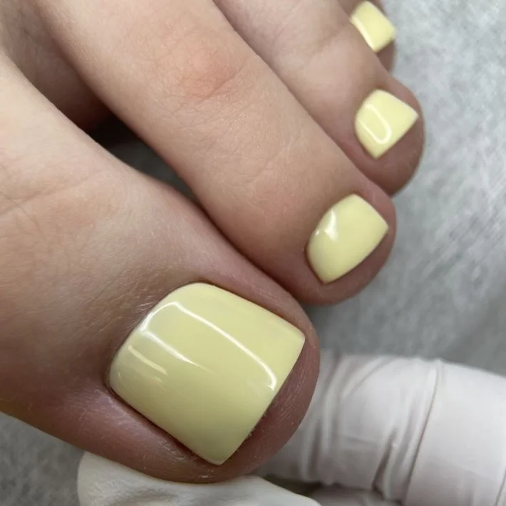summer toe nails colors 2026 Creamy Butter Yellow Nails That Feel Soft and Modern