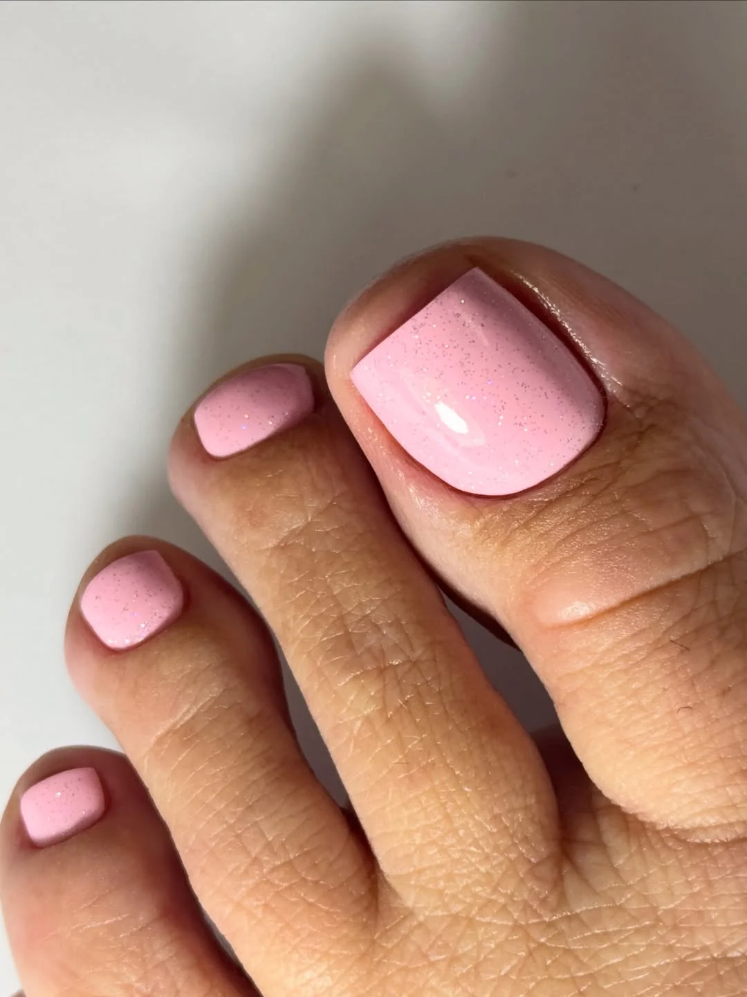 summer toe nails colors 2026 Sweet Cotton Candy Pink Toes With Delicate Sparkle