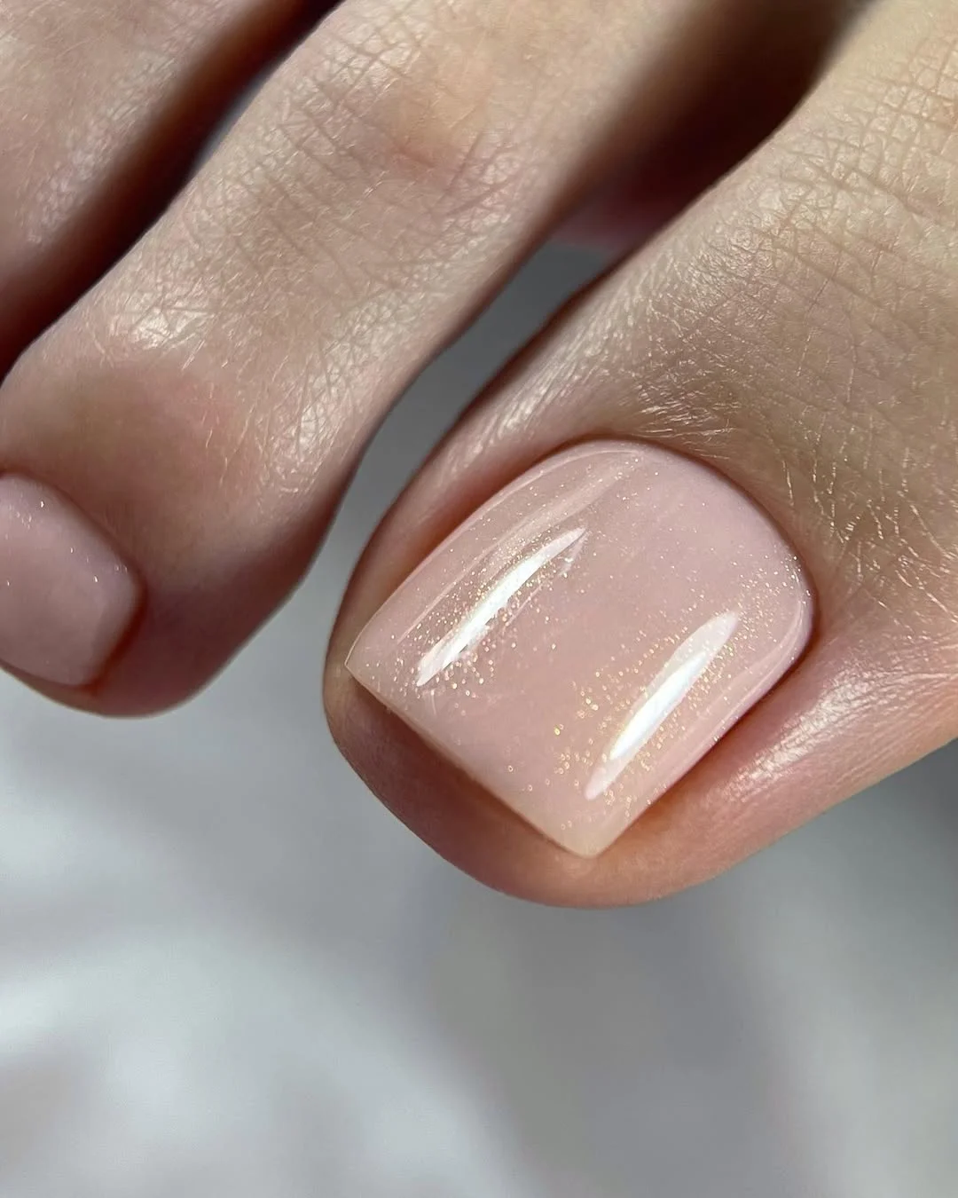 summer toes colors 2026 Soft Pearl Nude Toes for the Clean Girl Summer Aesthetic