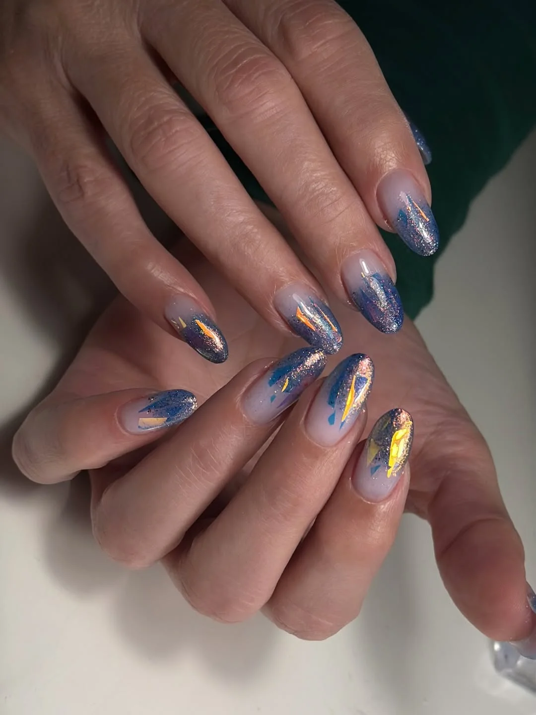 summer vacation nails 2026 Ocean Sparkle Gradient Nails With Midnight Blue Shimmer