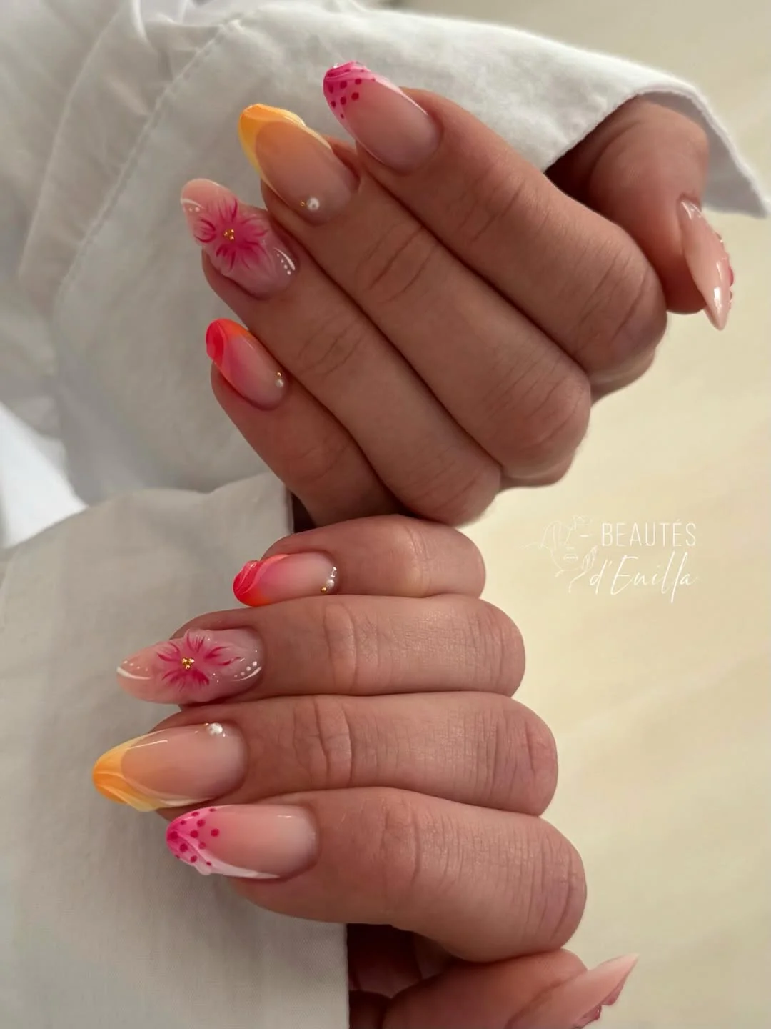 summer vibrant nails summer 2026 Sunset Floral Almond Nails With Tropical Heat