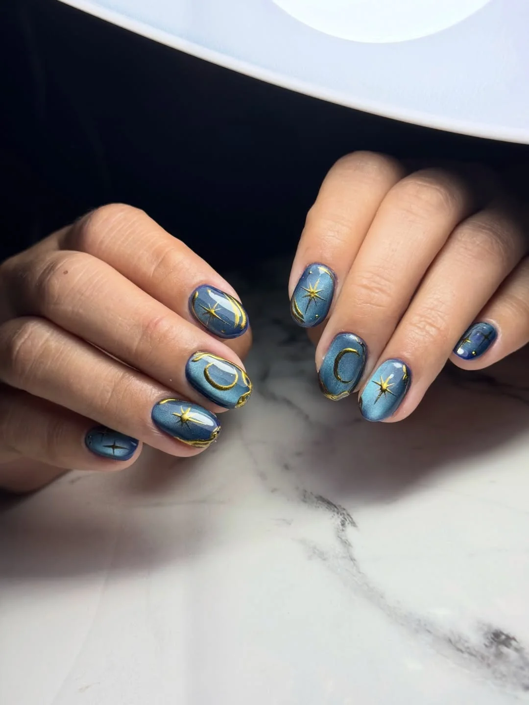 summer vibrant nails summer 2026 Celestial Midnight Blue Nails With Golden Star Accents