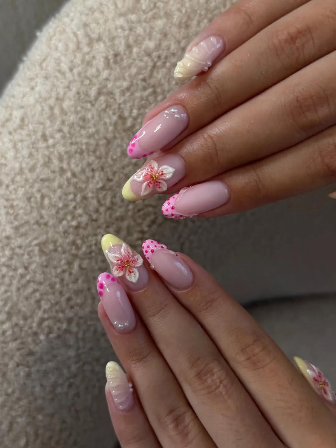 summer vibrant nails summer 2026 Glossy Pink Floral Nails With Soft Butter Yellow Accents