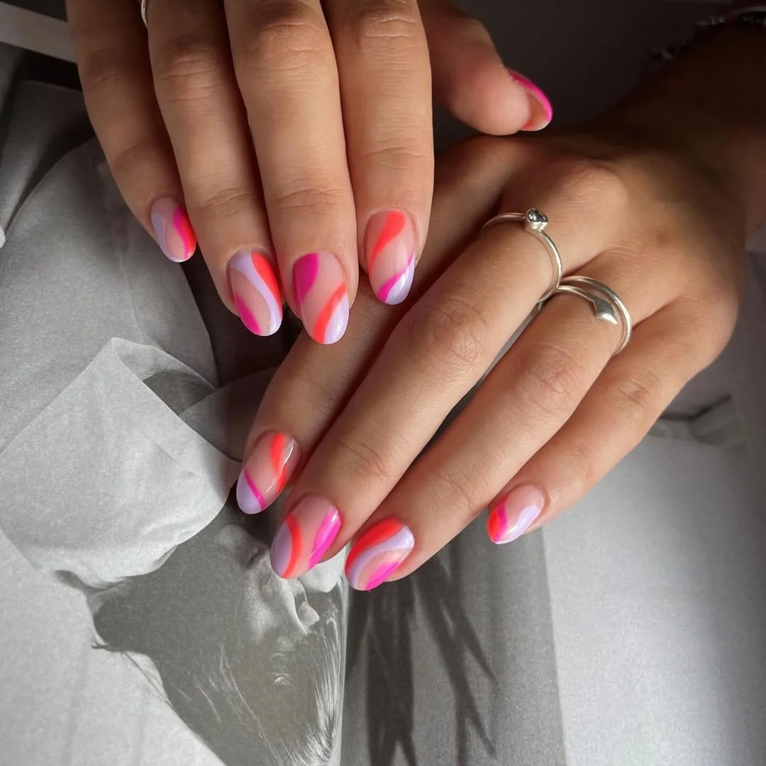 summer vibrant nails summer 2026 Neon Swirl Nails With Retro Pink And Coral Waves