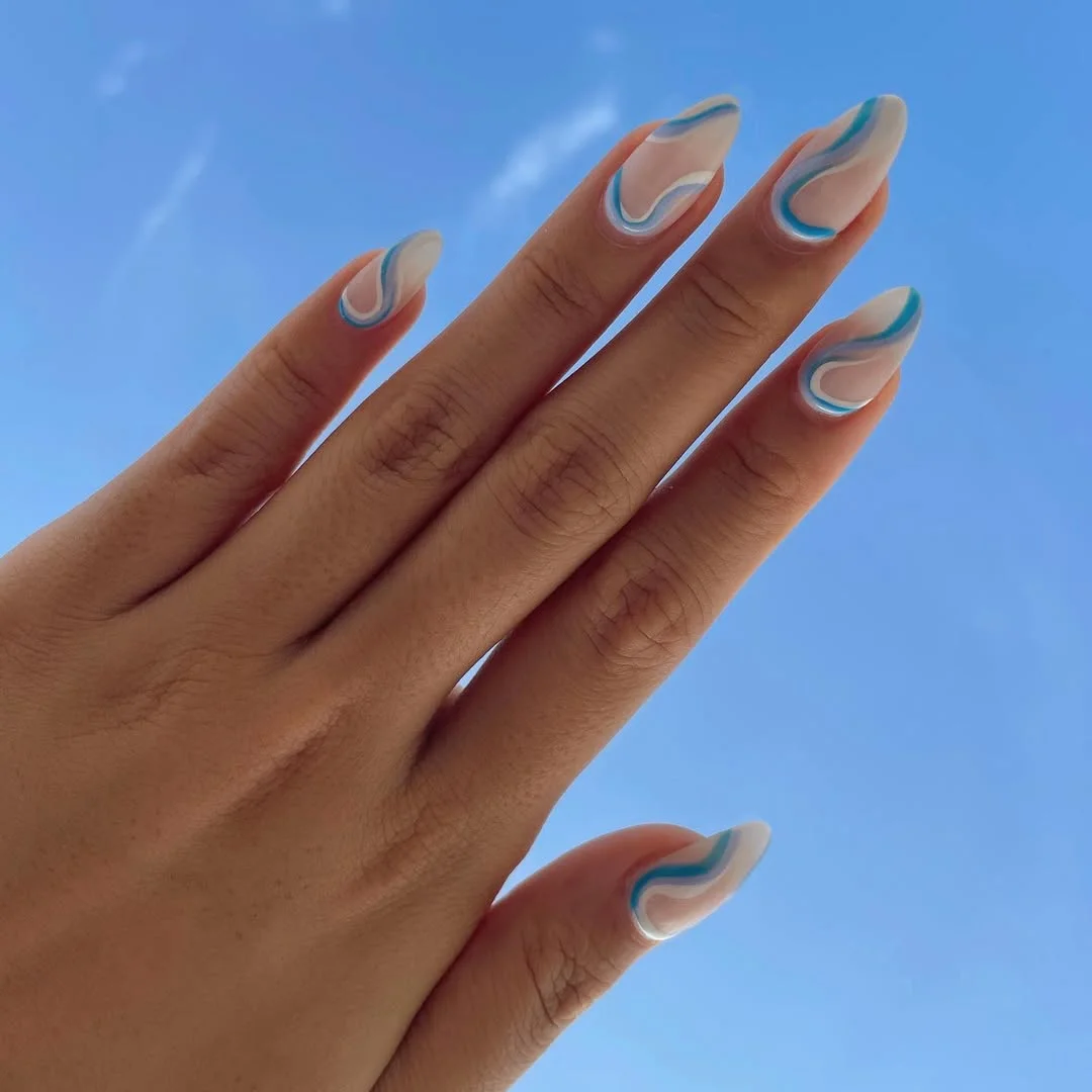 summer vibrant nails summer 2026 Minimal Blue Wave Nails With Ocean Inspired Lines