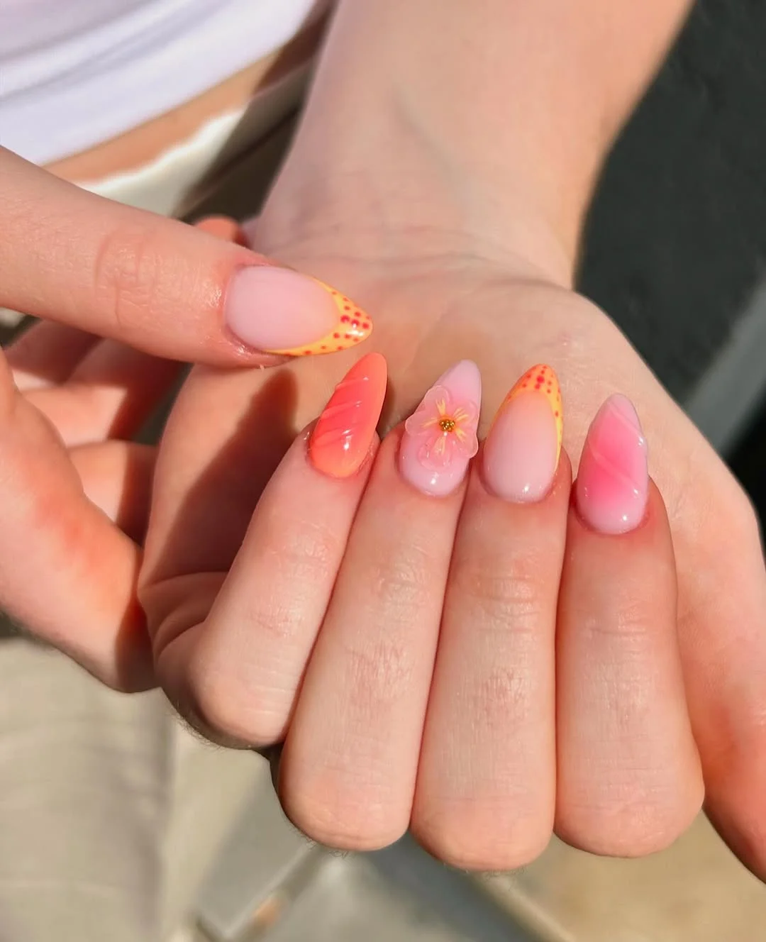 summer vibrant nails summer 2026 Coral And Pink Floral Nails With Tropical Sunset Energy