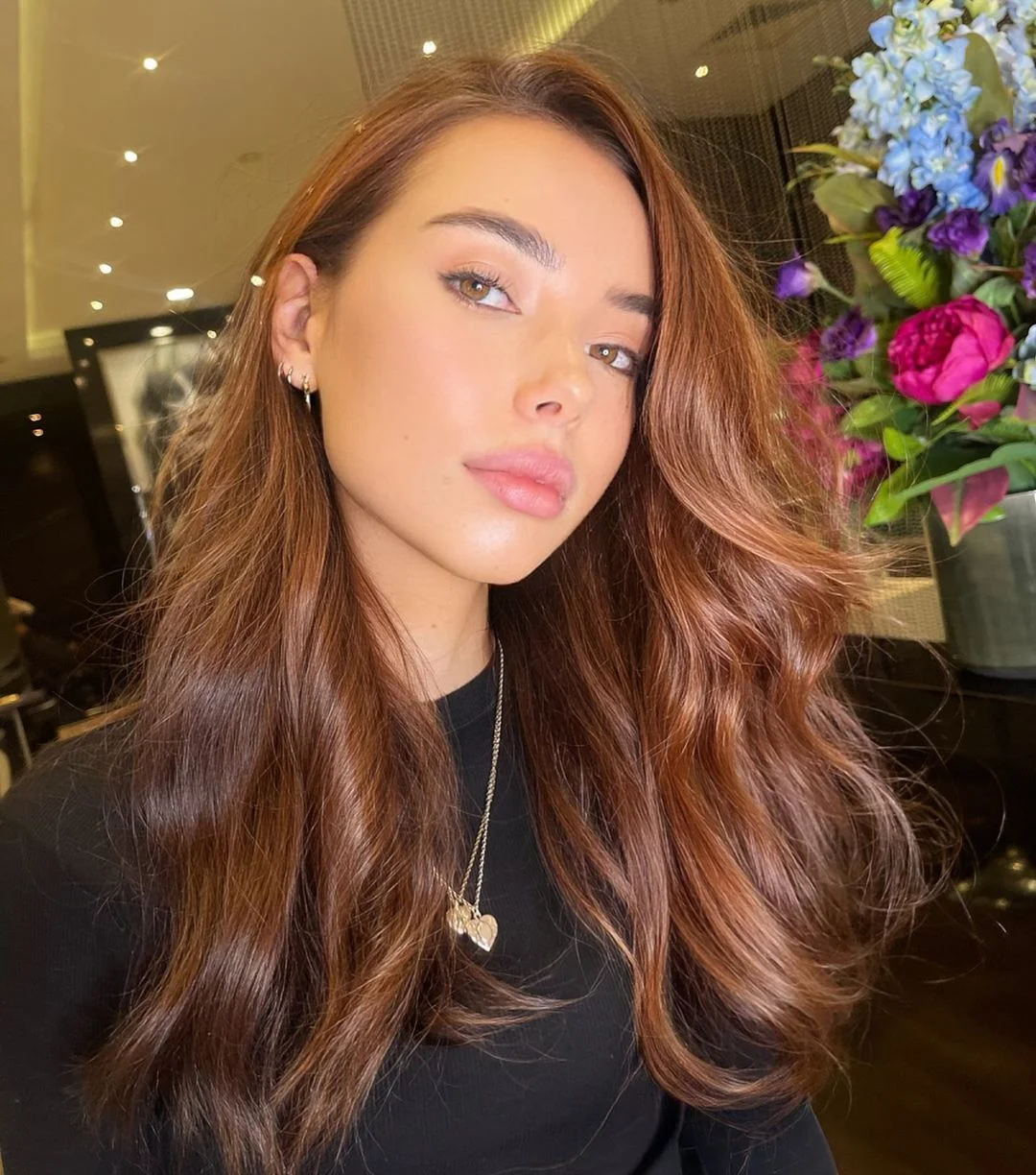 sun-kissed summer auburn hair color 2026 Glossy Cinnamon Auburn with Dimensional Flow