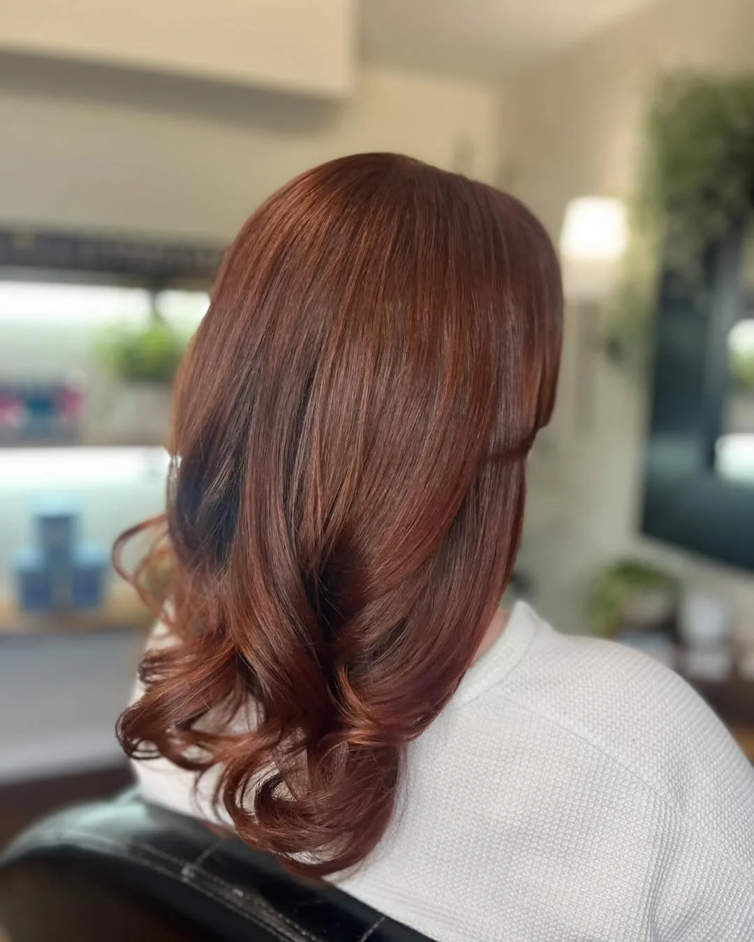 sun-kissed summer auburn hair color 2026 Classic Auburn Blowout with Polished Volume