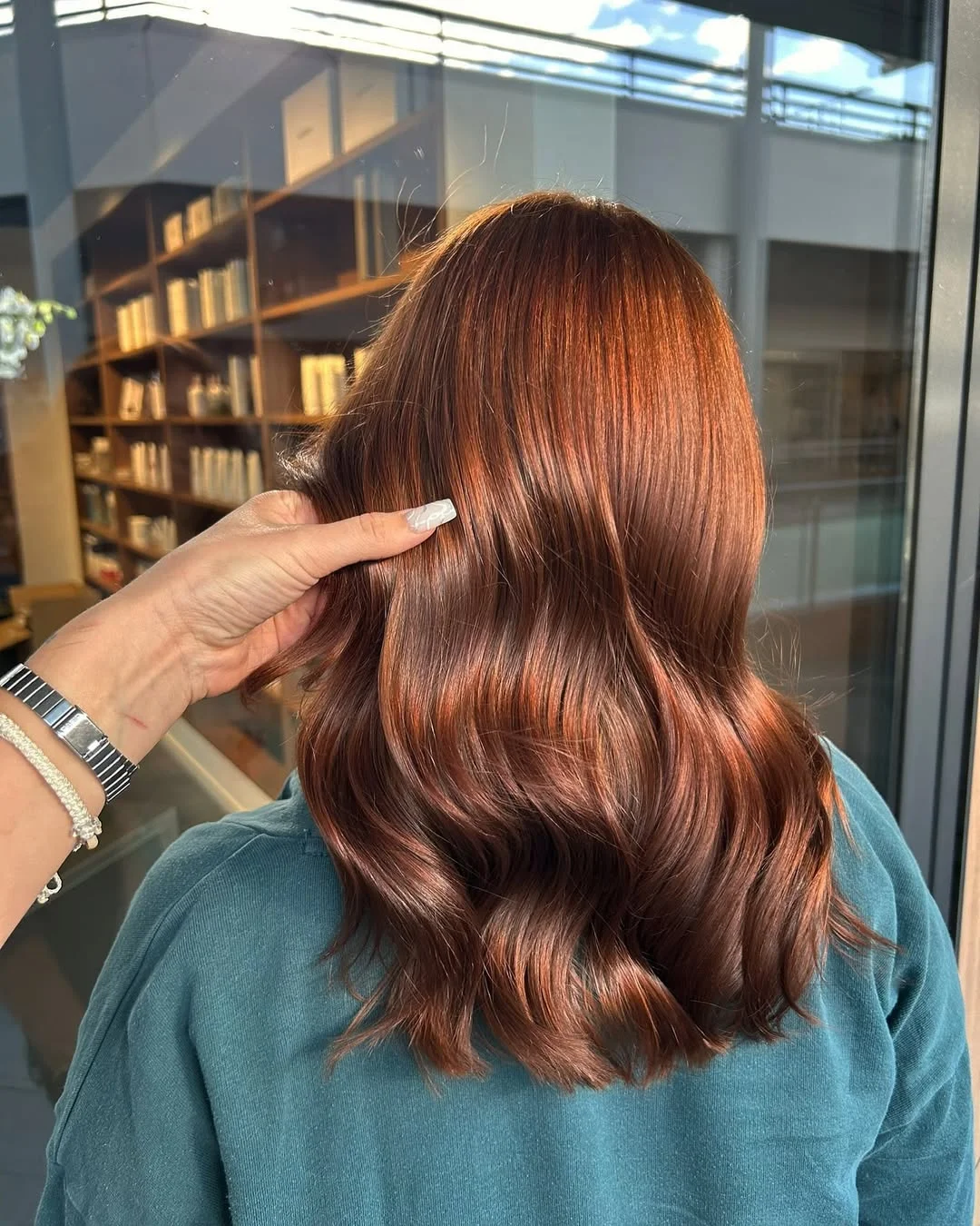 sun-kissed summer auburn hair color 2026 Rich Copper Auburn with Silky Depth