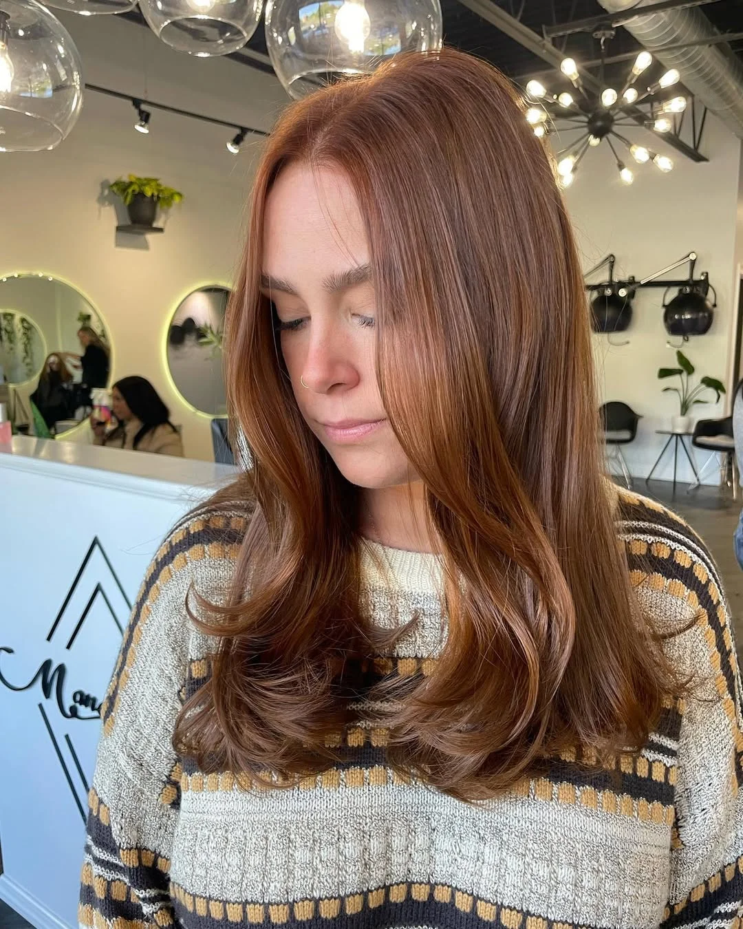 sun-kissed summer auburn hair color 2026 Warm Chestnut Auburn with Feathered Ends