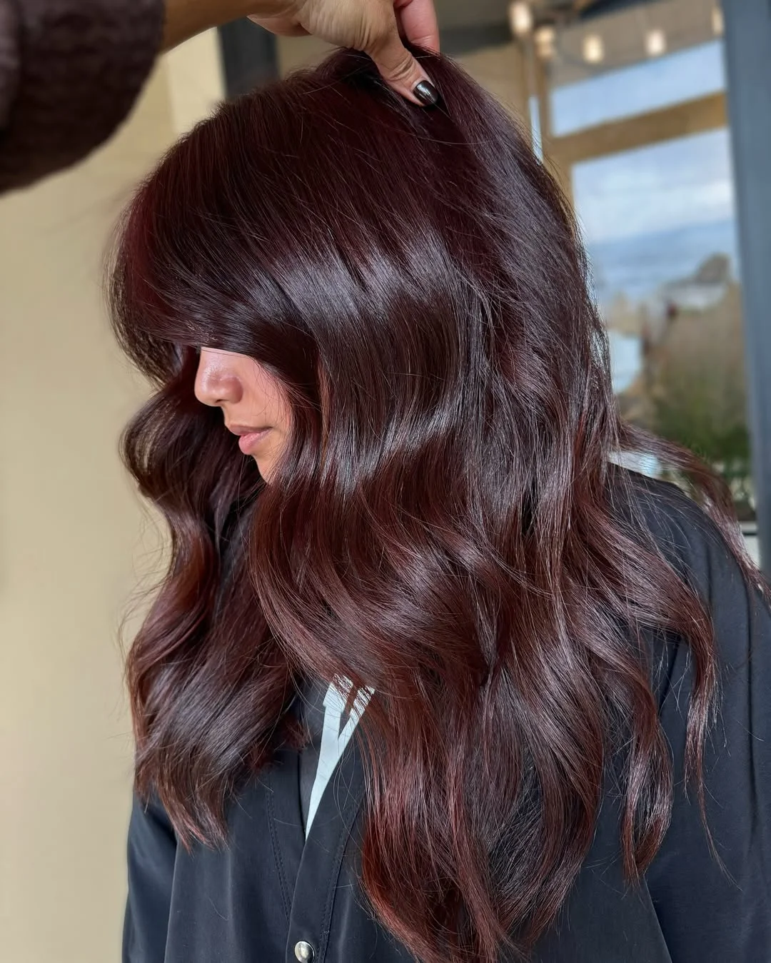 sun-kissed summer auburn hair color 2026 Deep Velvet Auburn with Voluminous Waves