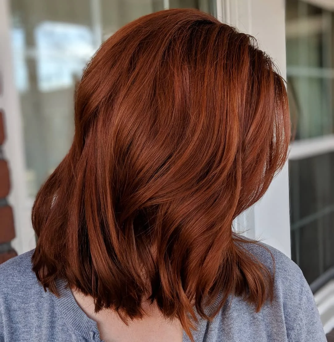 sun-kissed summer auburn hair color 2026 Classic Copper Auburn Lob with Soft Movement