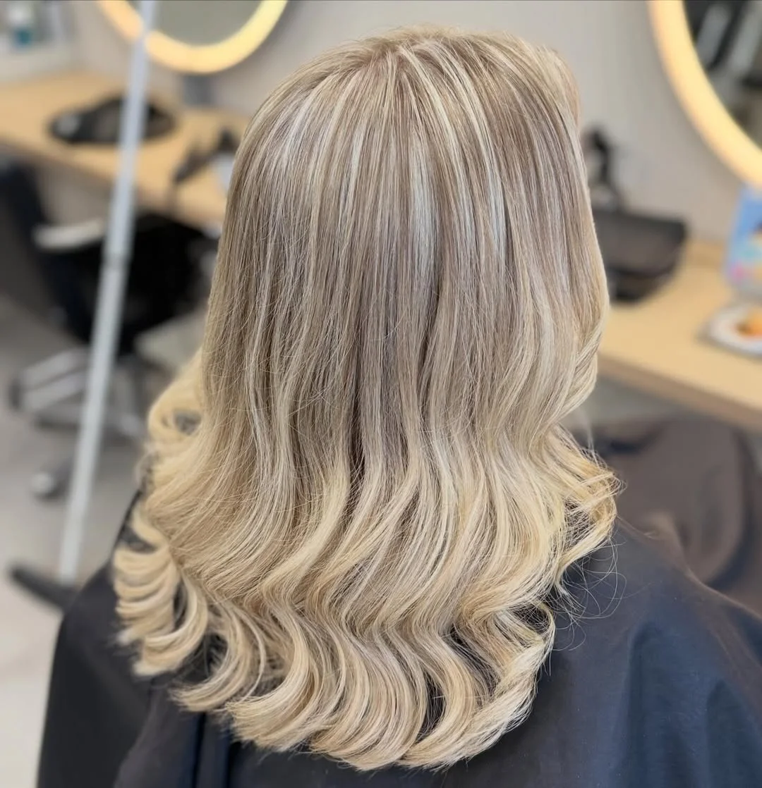 timeless summer haircuts for women over 40 2026 Platinum Textured Waves With Airy Volume